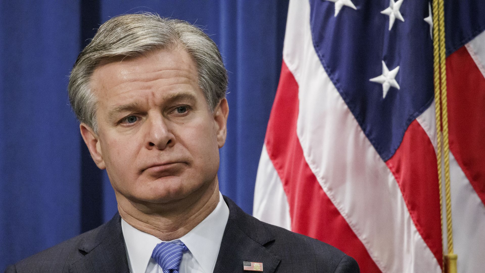 FBI Director Christopher Wray looks on during a press conference at the U.S. Department of Justice on December 6, 2023 in Washington, DC. 