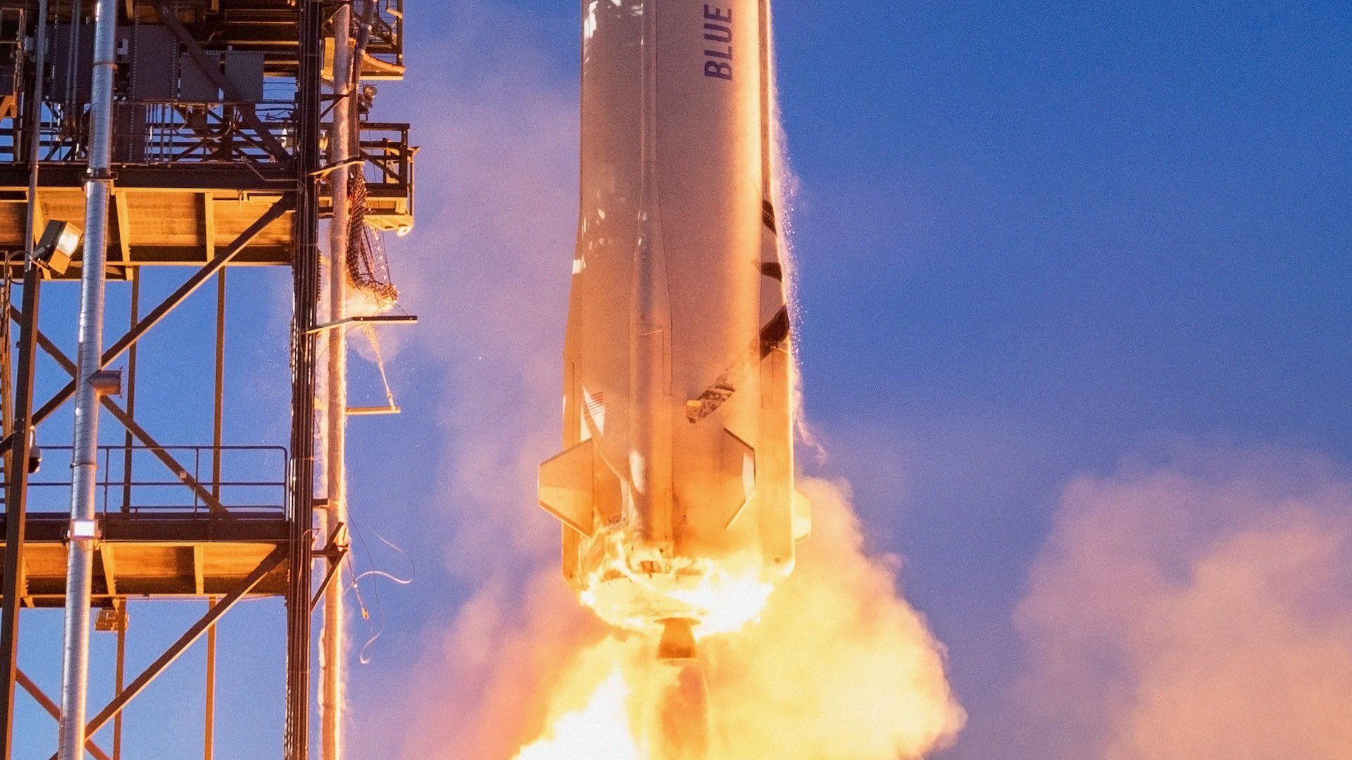 A close-up of a fiery rocket launch by Blue Origin