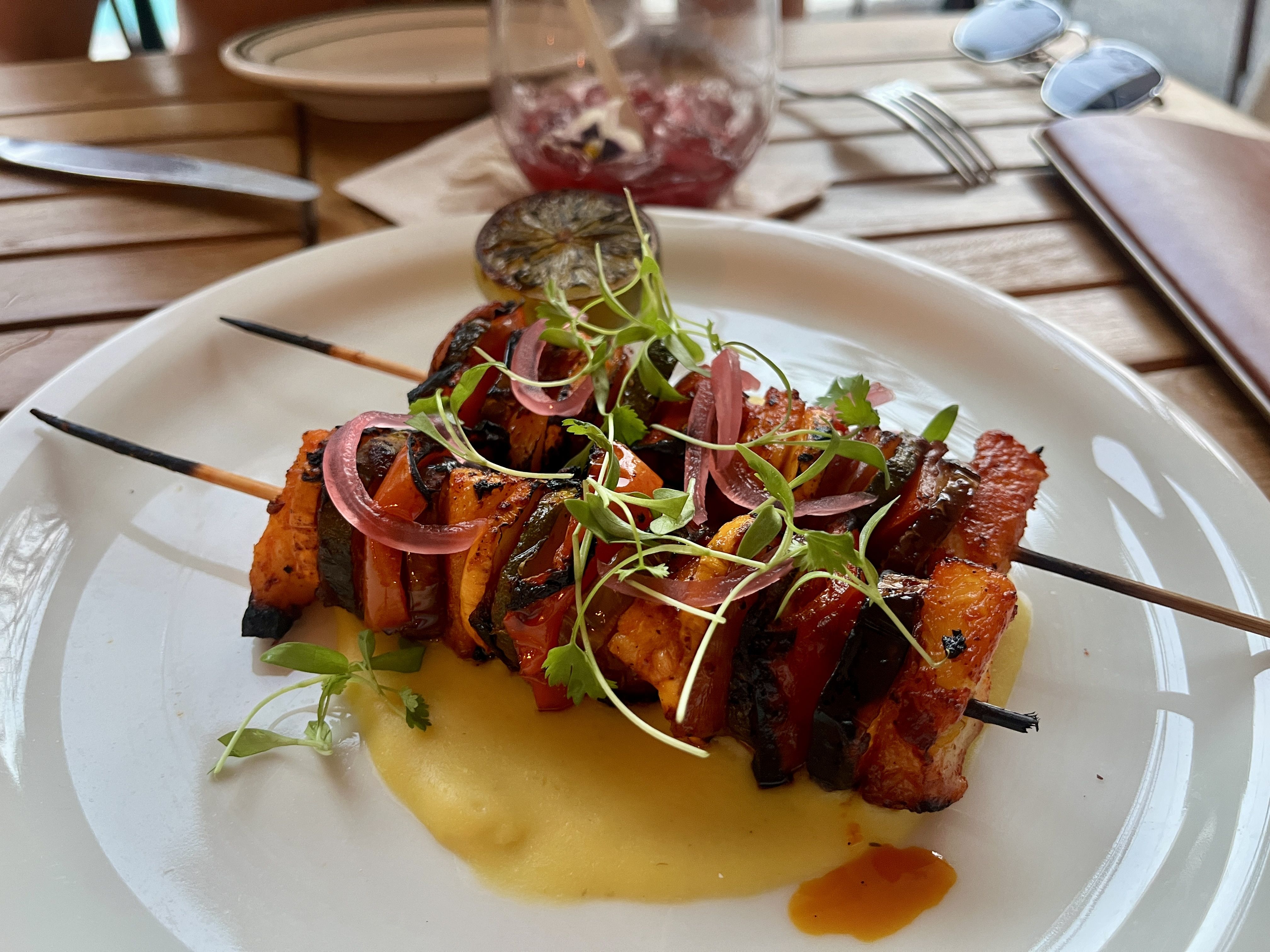 A plate of vegetable kebabs.