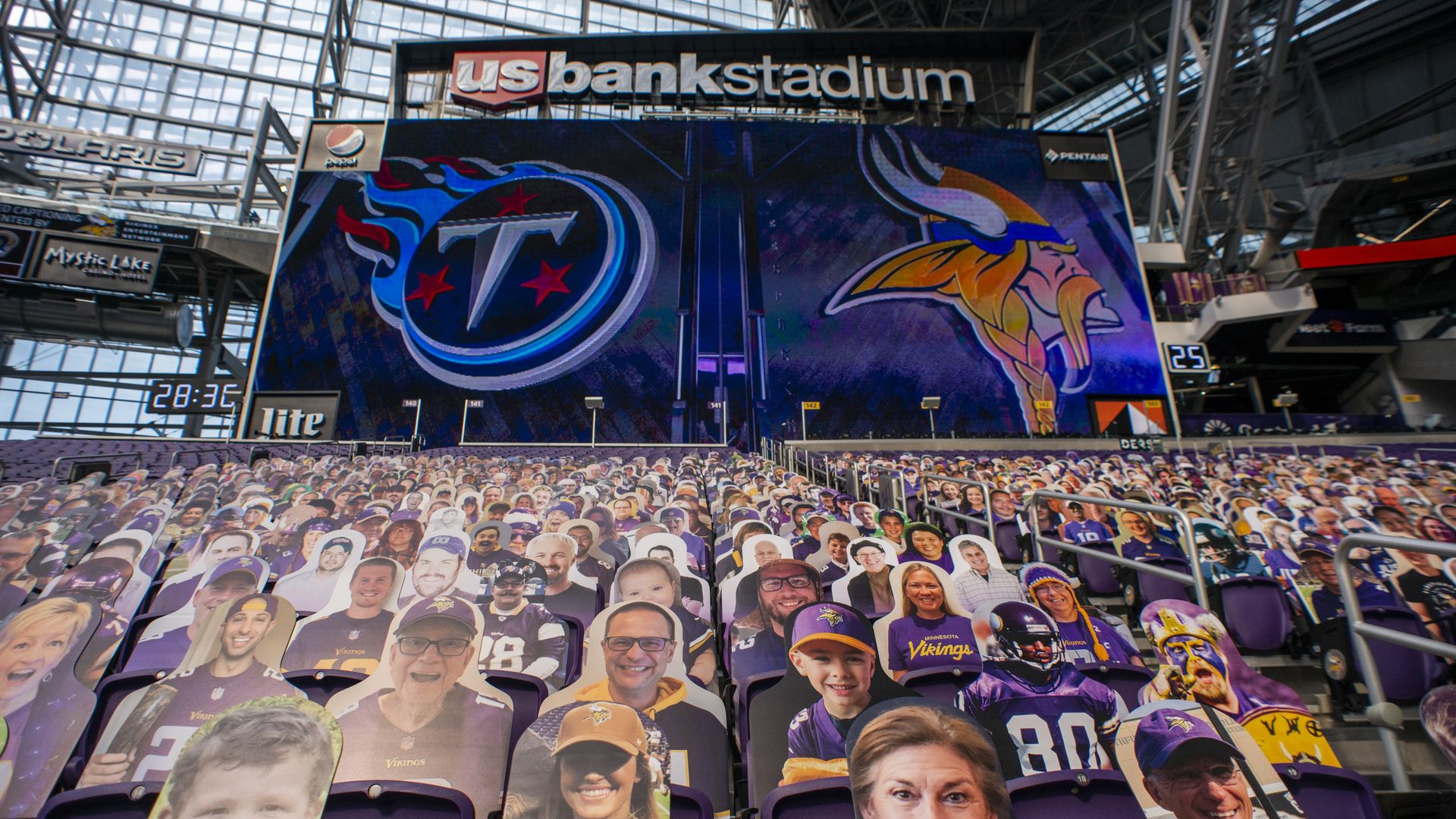 Cutouts of fans are afixed to seats before the game between the Tennessee Titans and Minnesota Vikings
