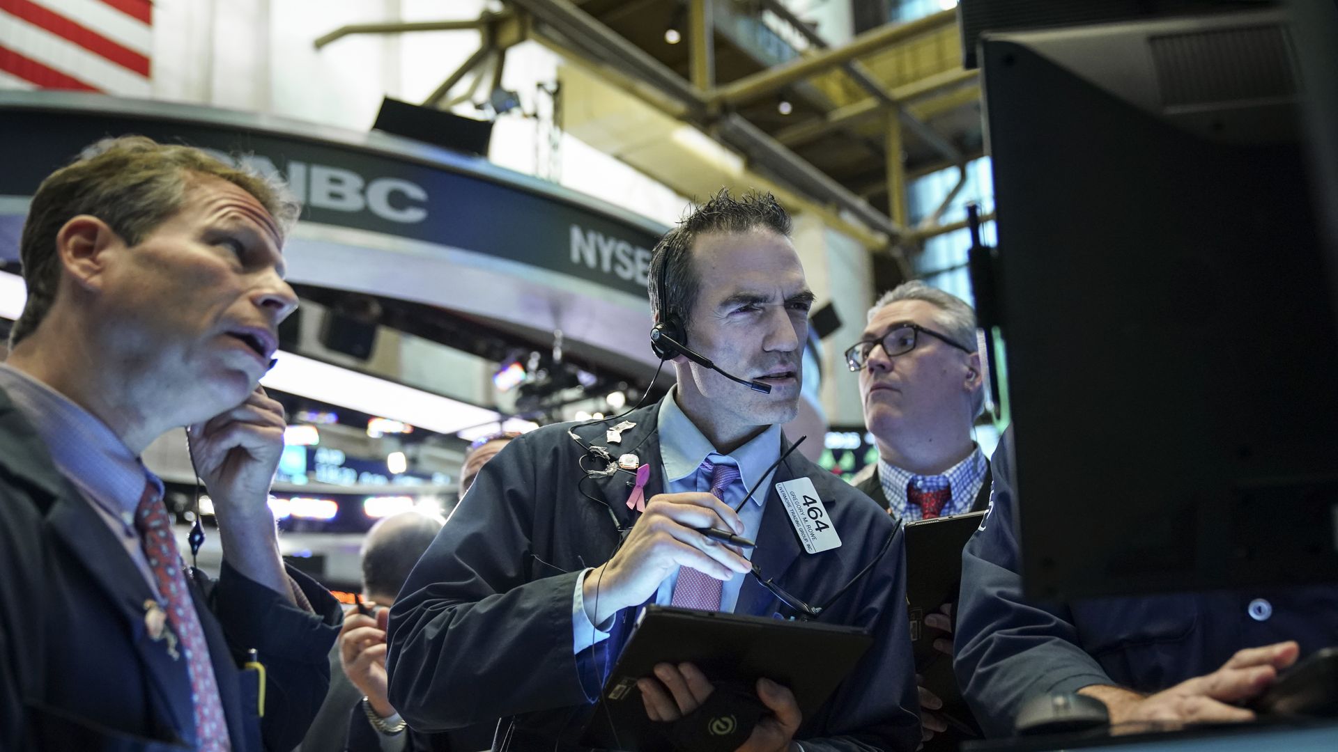 Brokers on the floor of the New York Stock Exchange