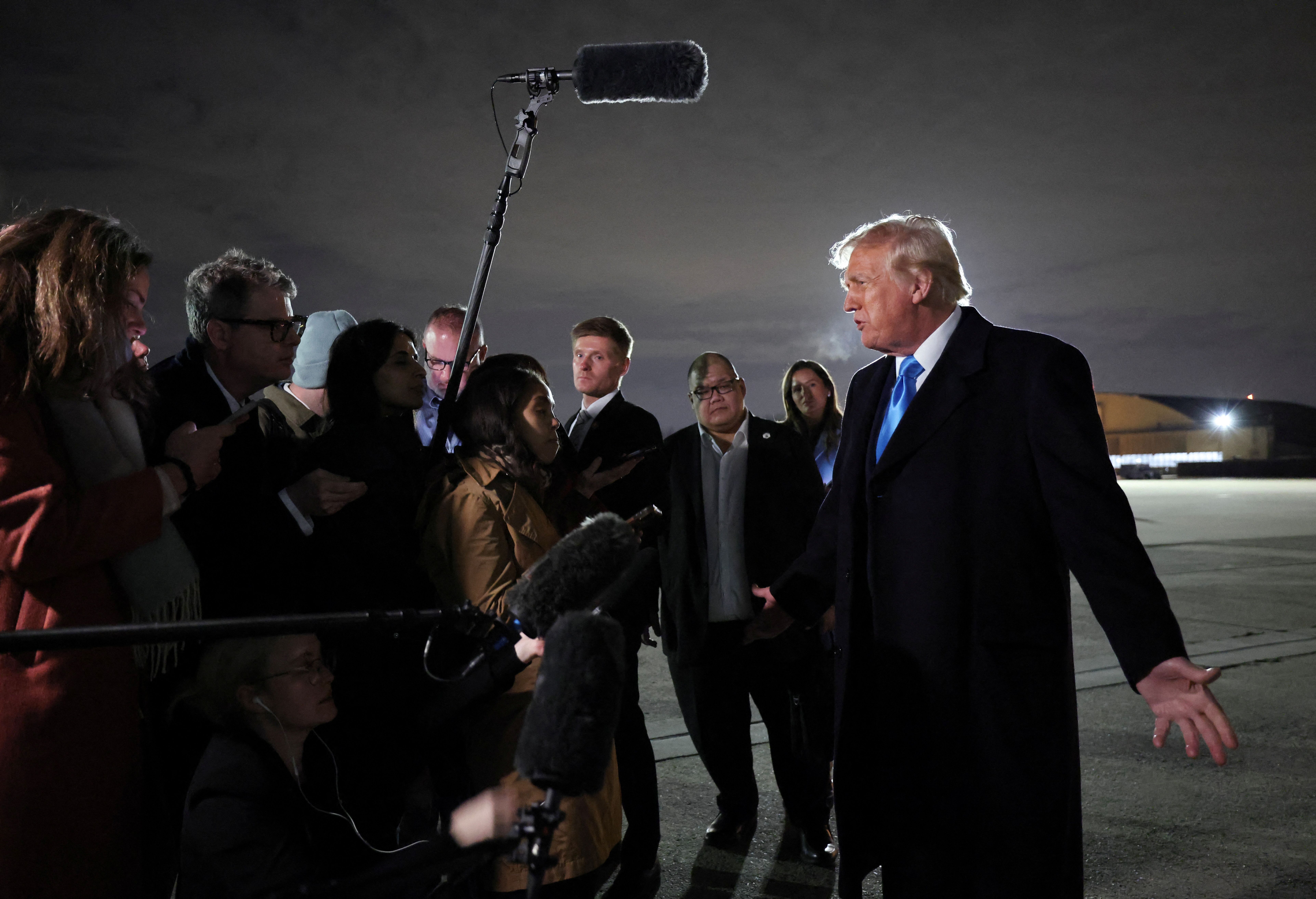U.S. President Donald Trump speaks to reporters after stepping from Air Force One upon his return to Washington, at Joint Base Andrews in Maryland, U.S., February 2, 2025. REUTERS/Kevin Lamarque