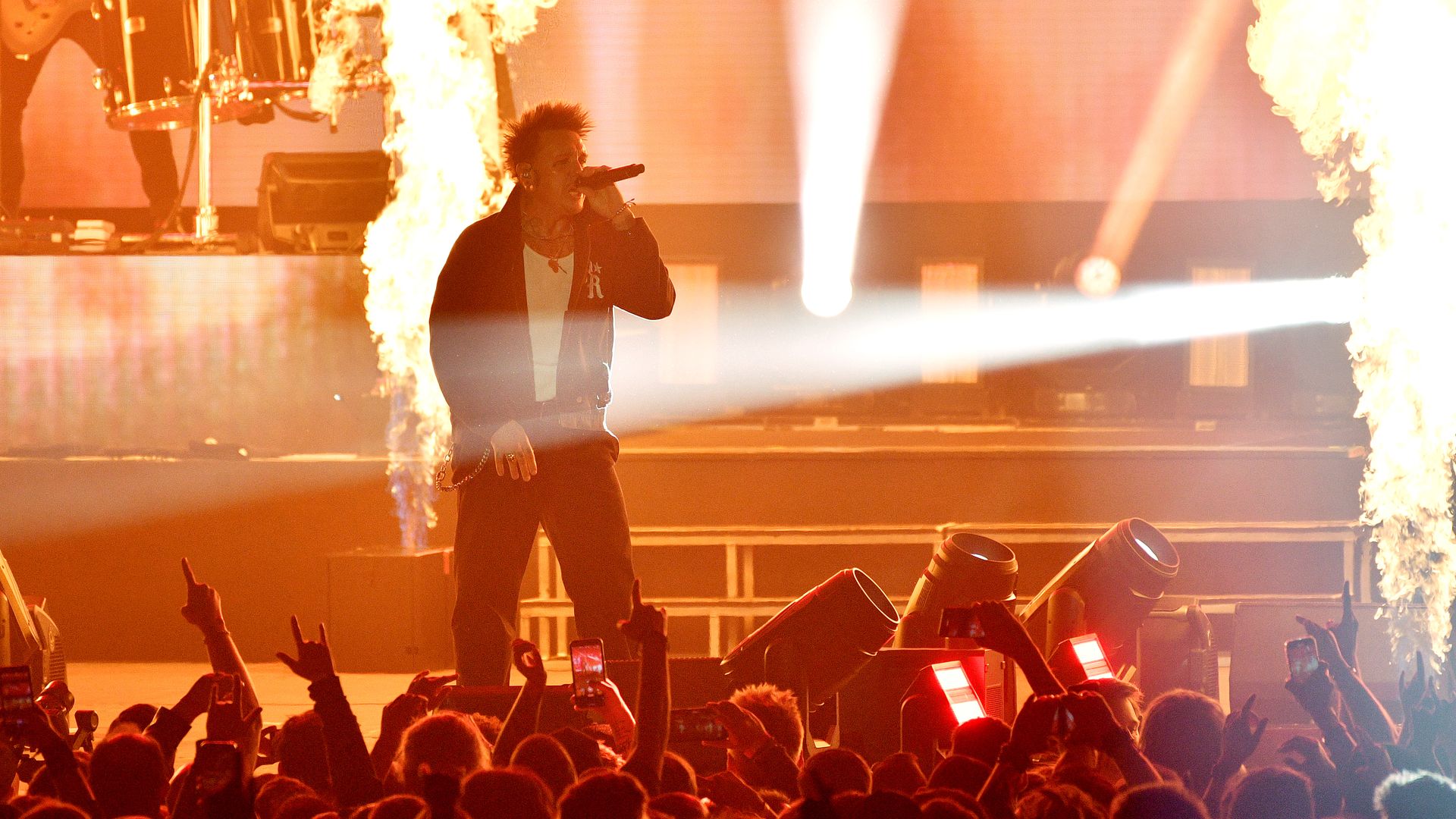Papa Roach performs with fire surrounding them
