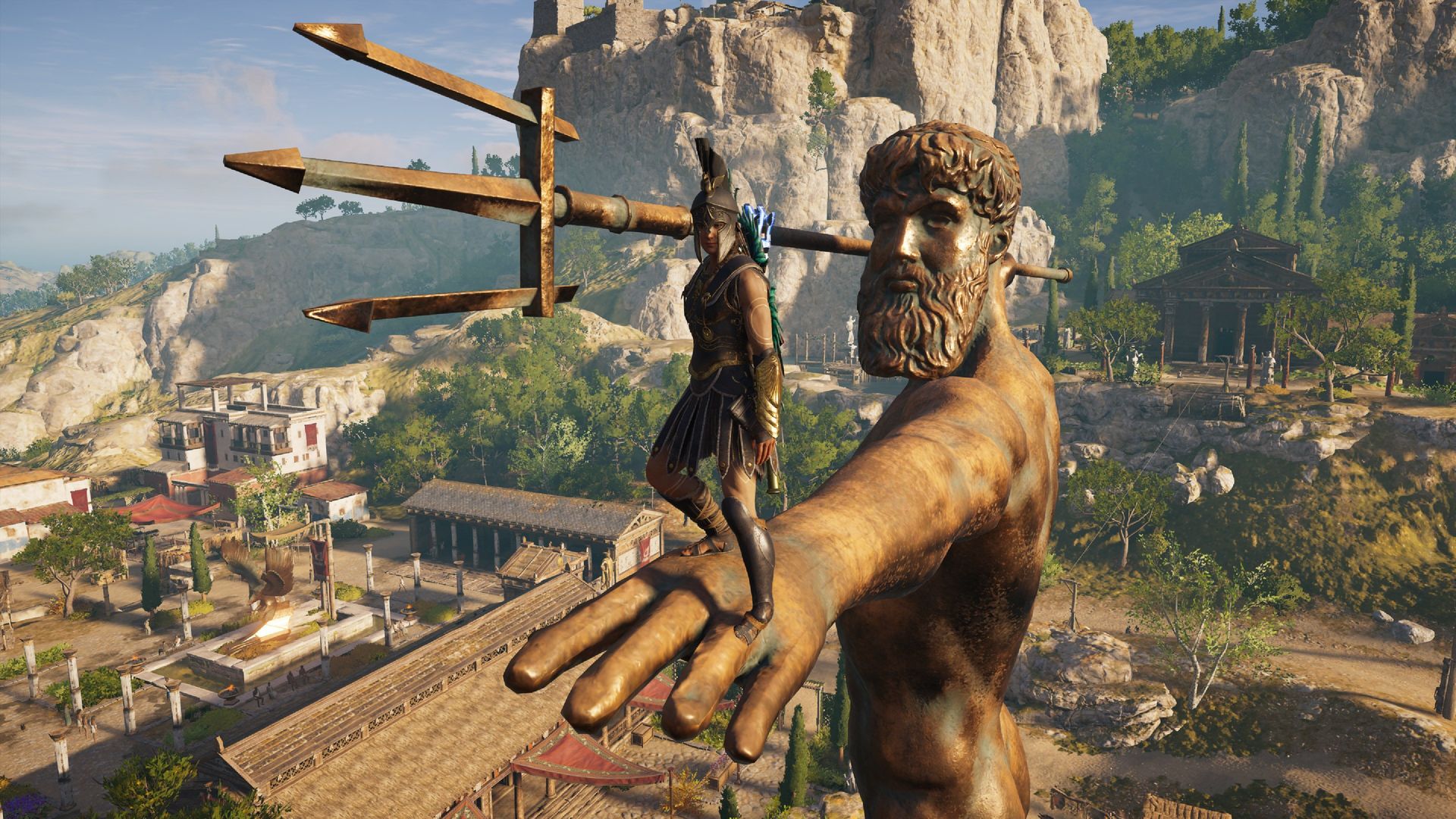 Screenshot of a warrior standing on a giant statue of Poseidon in Ancient Greece