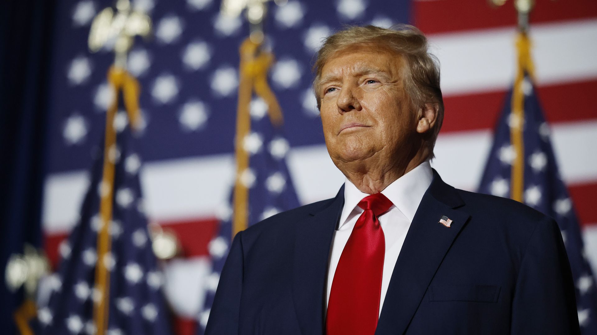 : Former President Donald Trump speaks at his caucus night event at the Iowa Events Center on January 15, 2024 in Des Moines, Iowa.