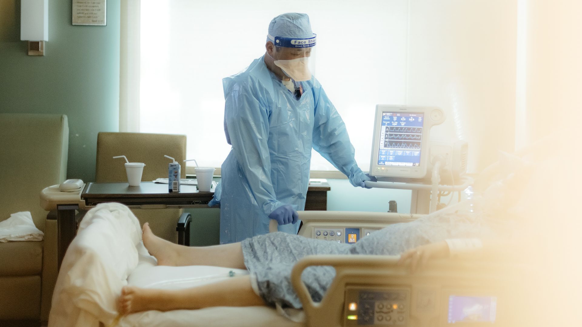 A nurse checks on a patient in the ICU Covid-19 ward at NEA Baptist Memorial Hospital in Jonesboro, Arkansas, U.S., on Wednesday, Aug. 4, 2021. 