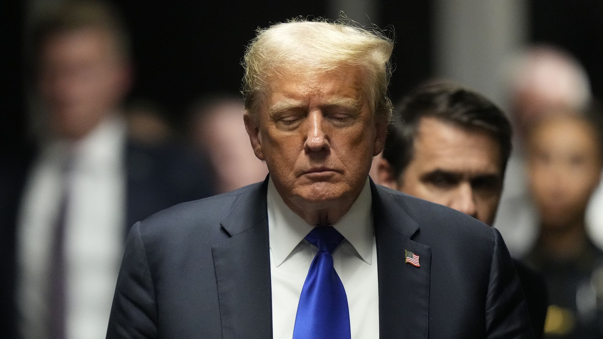 Trump looks down as he leaves Manhattan Criminal Court after being found guilty in his hush money trial. 