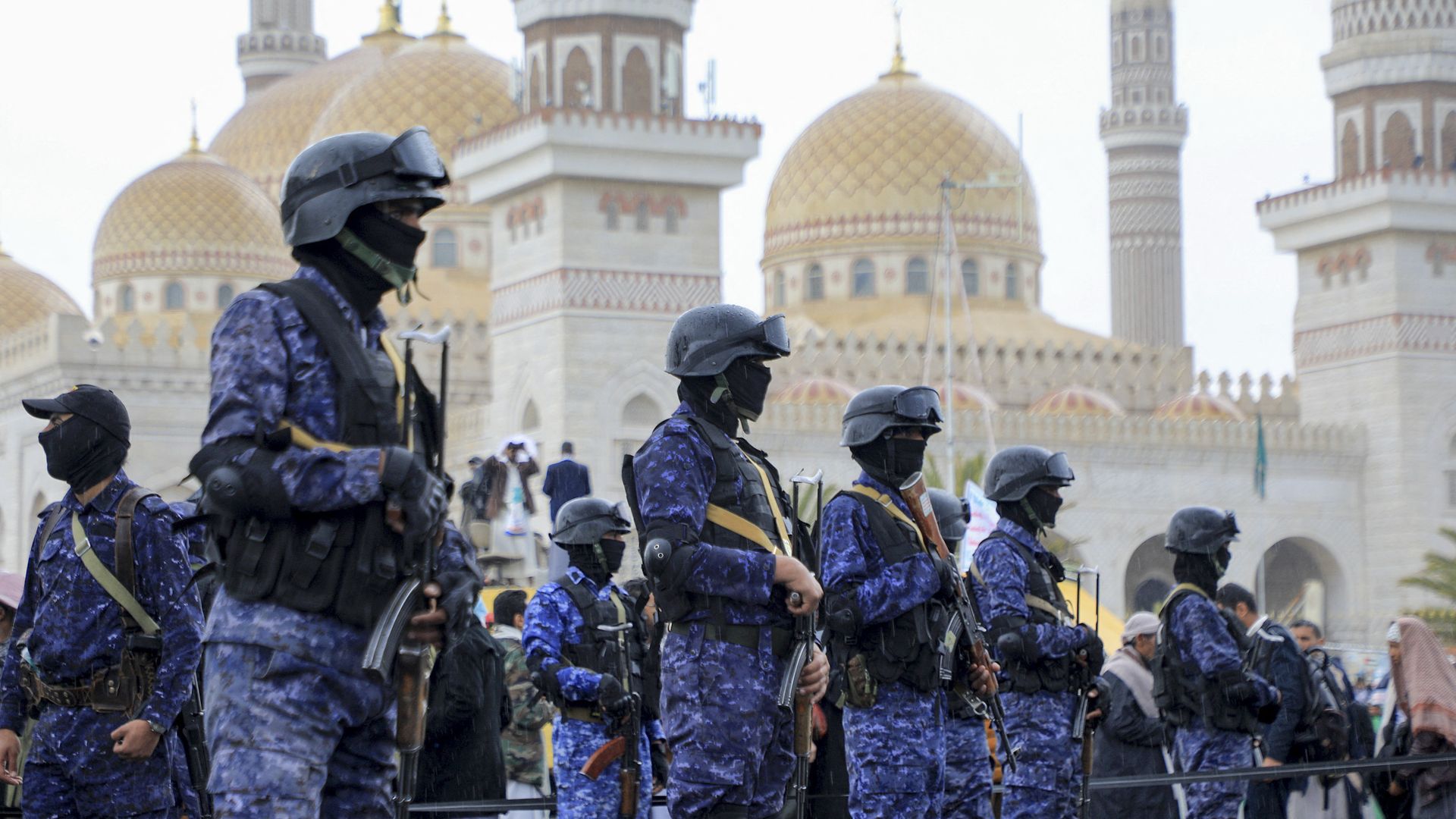 Members of Huthi security forces stand guard during an anti-Israel and anti-US rally in the Huthi-controlled capital Sanaa on January 19, 2024.