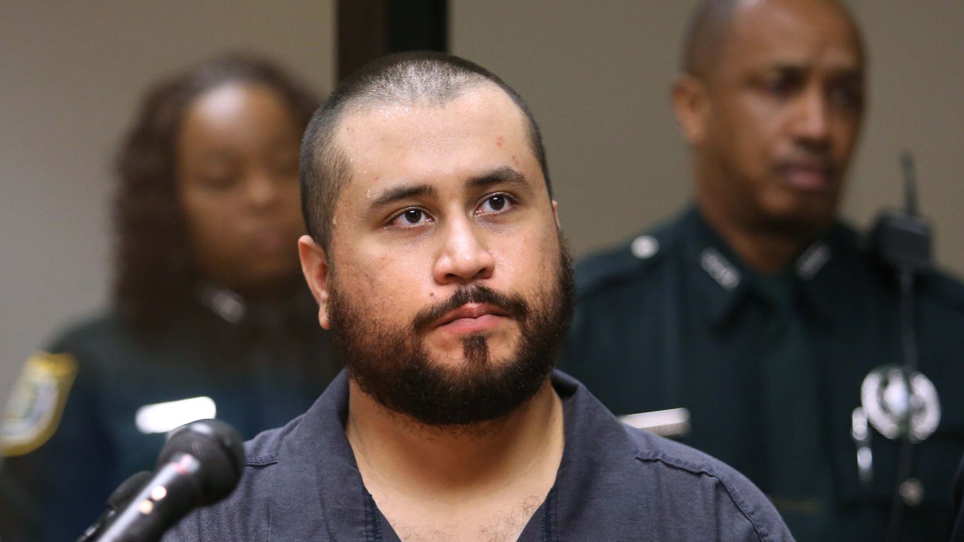 George Zimmerman, shooter in the death of Trayvon Martin, faces a judge during a hearing on charges including aggravated assault of his girlfriend November 19, 2013 in Sanford, Florida.