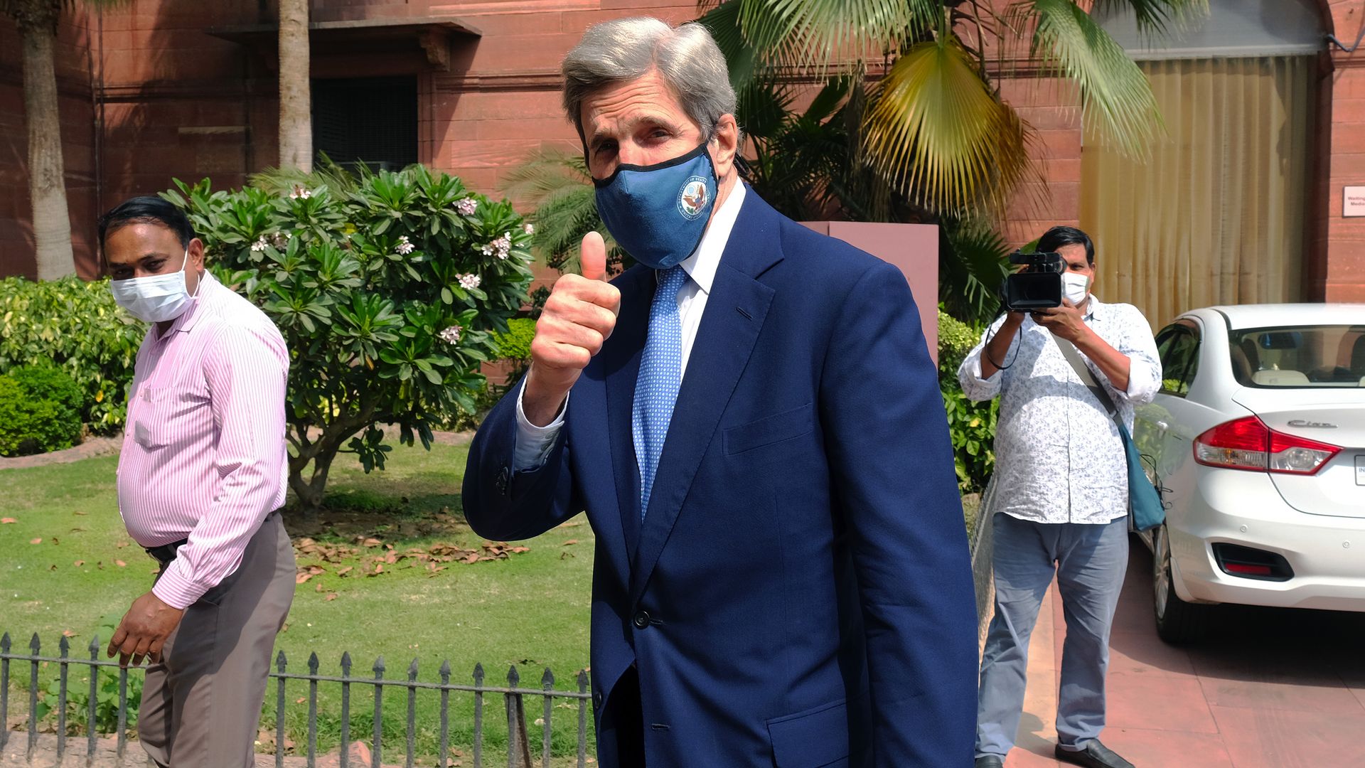 Image of Special Presidential Envoy for Climate Change John Kerry giving a thumbs up sign.
