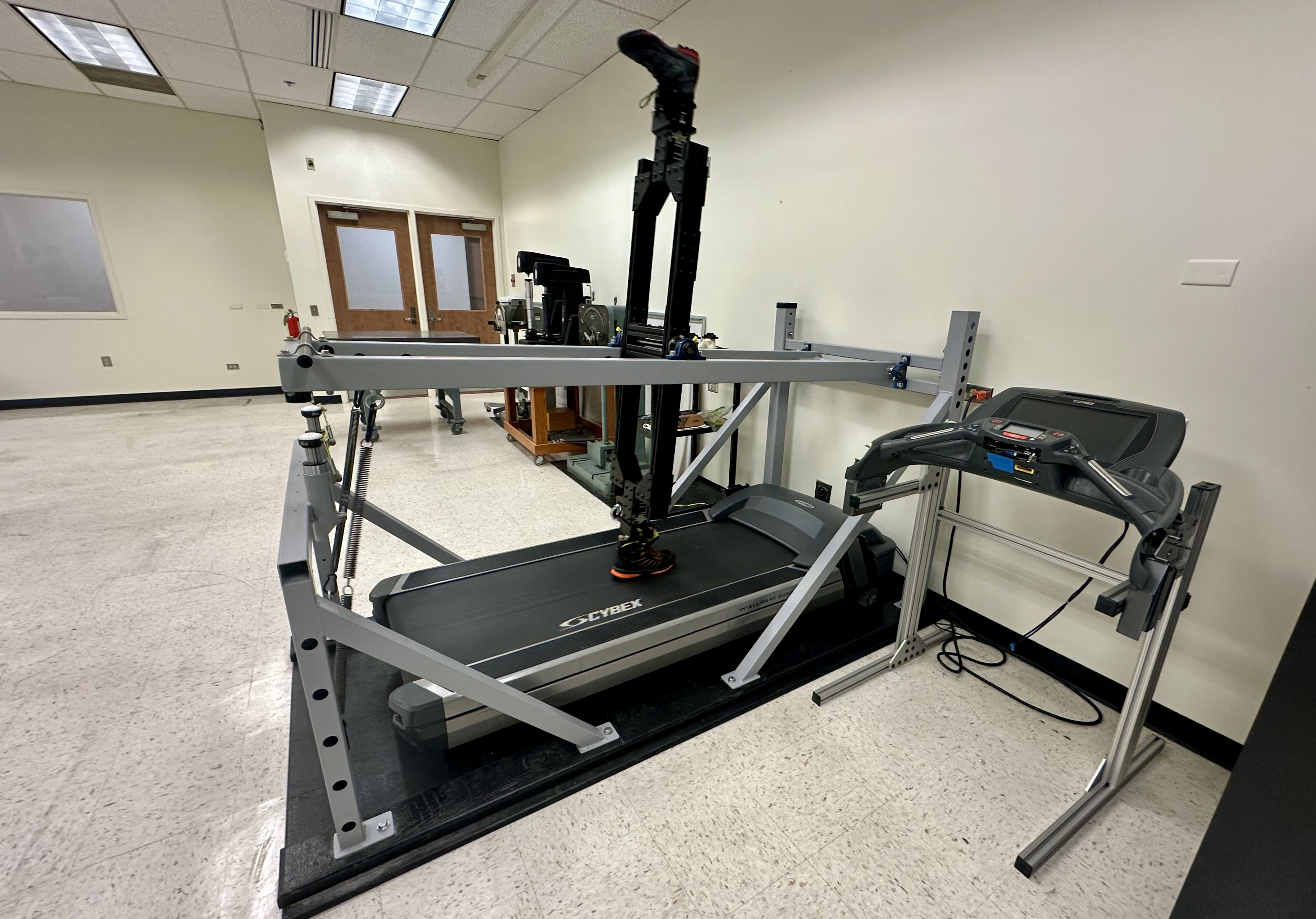 The Heeluxe Time Machine tests hiking boots for wear and tear over 150 miles on a treadmill. Photo: John Frank/Axios