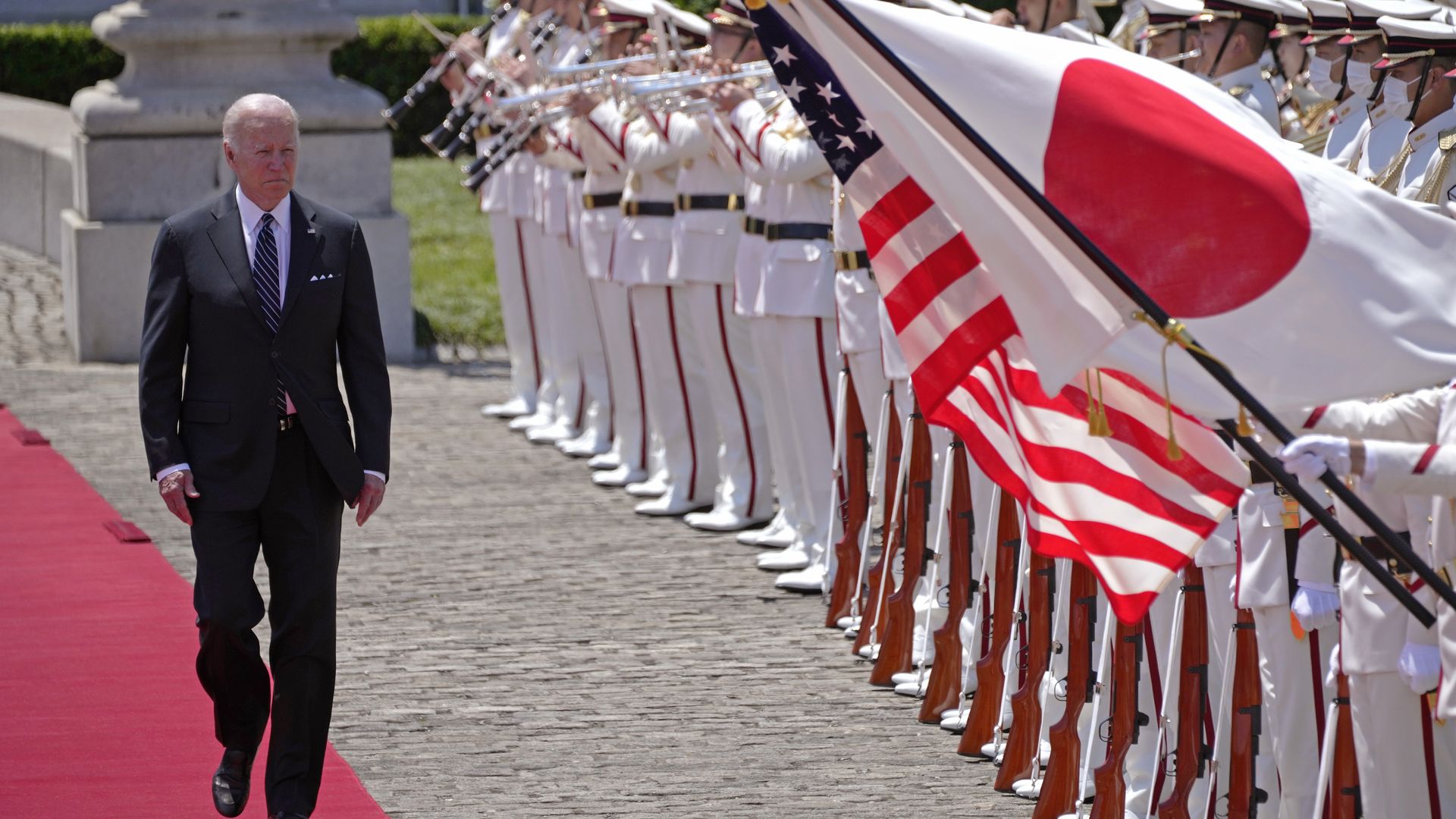 President Joe Biden reviews an honour guard during a welcome ceremony for Biden at the Akasaka State Guest House on May 23, 2022 in Tokyo, Japan.