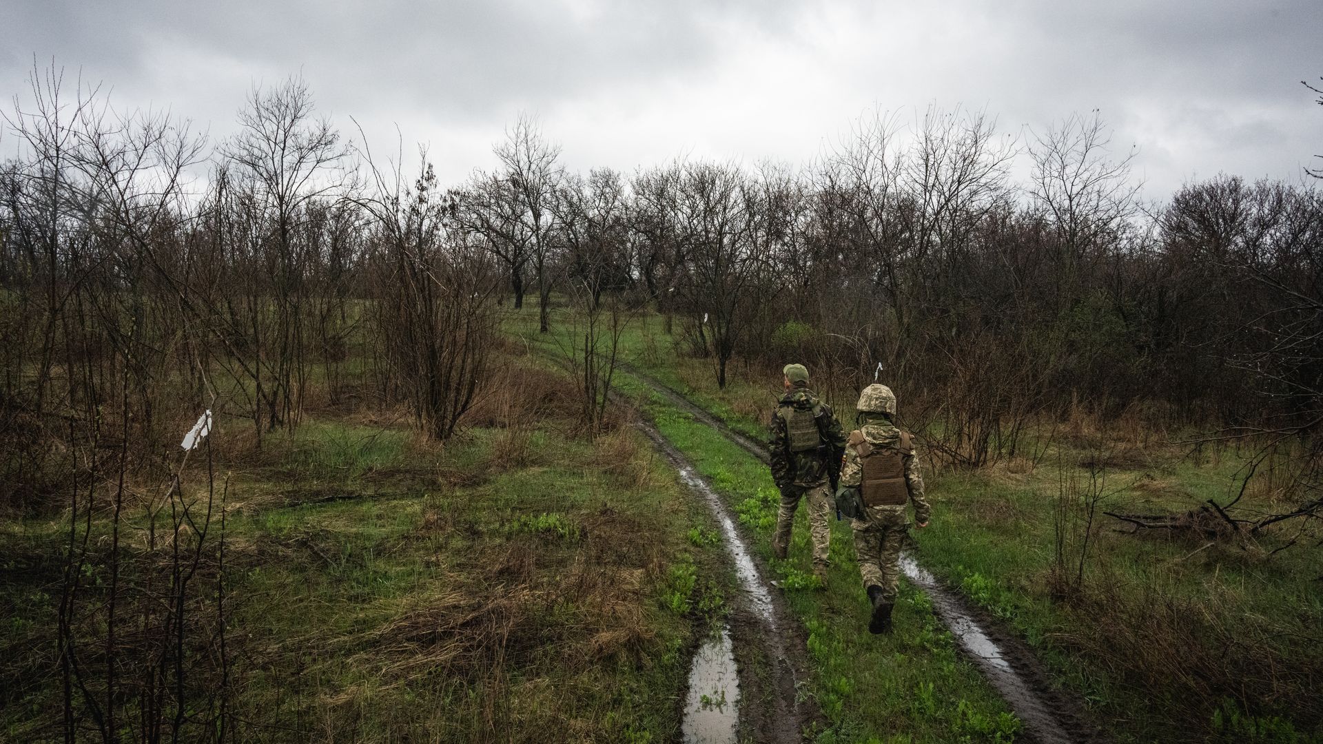 Ukrainian servicemen are seen along the frontline in Donbas