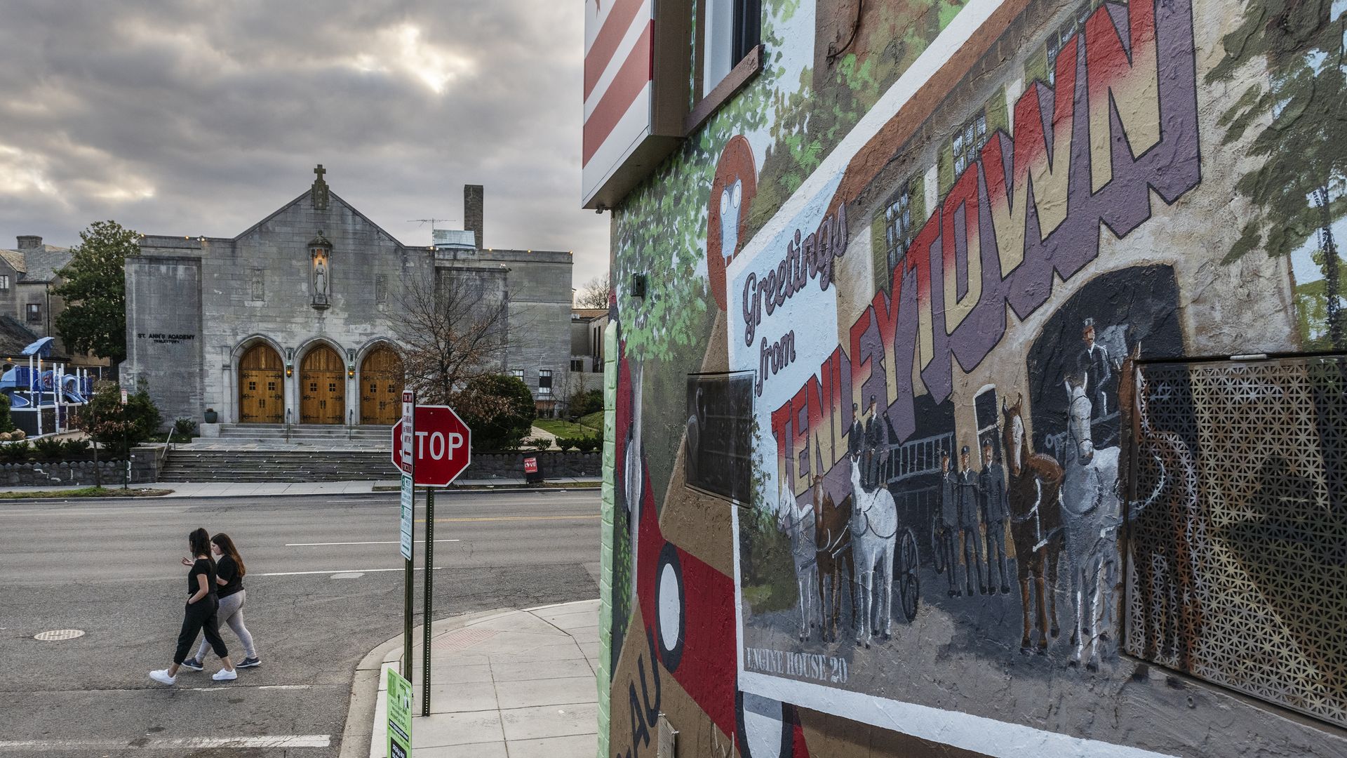 A photo of a Tenleytown D.C. mural in the foreground