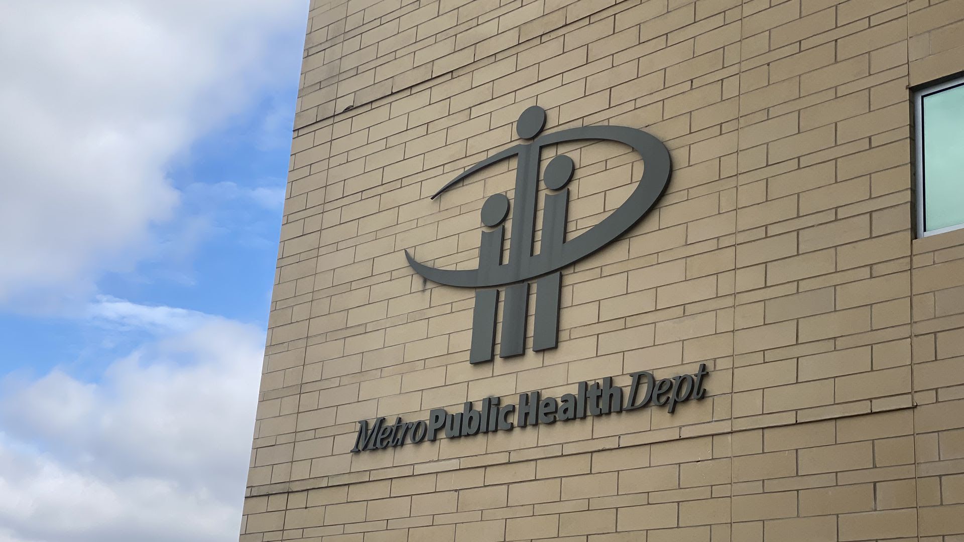 The exterior of the brick building of the Lentz Public Health Center. 