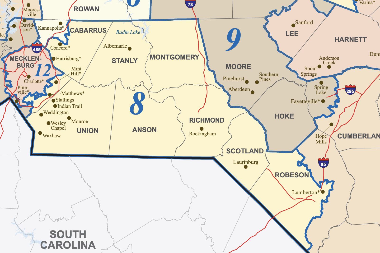 Map showing counties in North Carolina near South Carolina, including Mecklenburg, Union, Anson, Richmond, Scotland, Robeson, Hoke, Moore, Lee, and Harnett counties with major towns and highways.