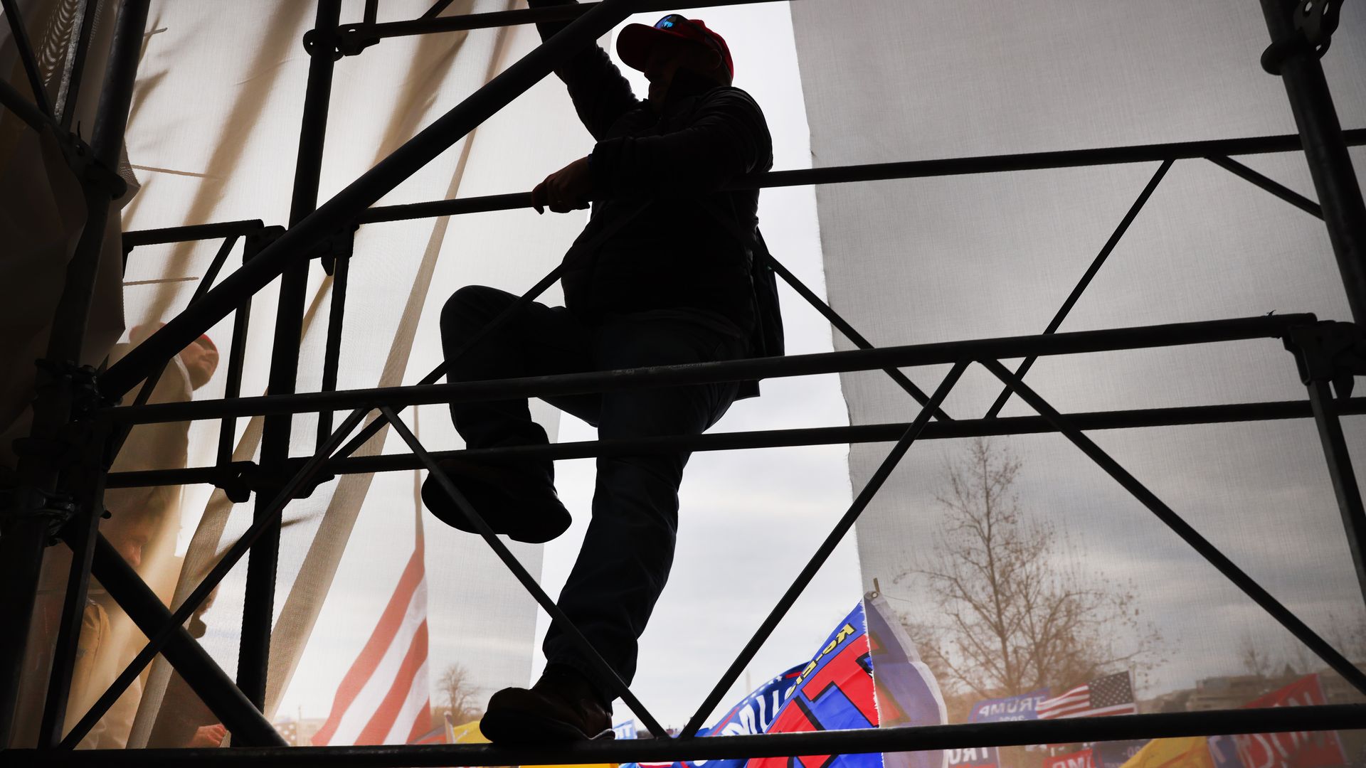 A Trump supporter is seen assaulting the U.S. Capitol on Jan. 6, 2021.
