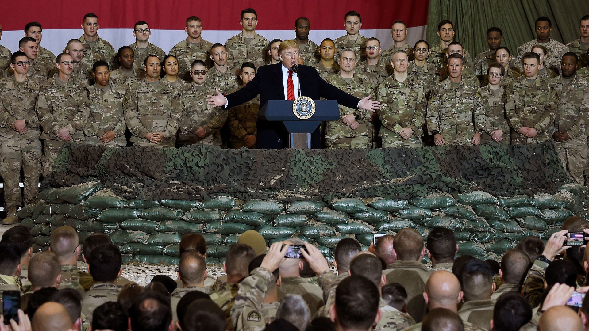 President Donald Trump speaks to the troops during a surprise Thanksgiving day visit at Bagram Air Field in Afghanistan. 