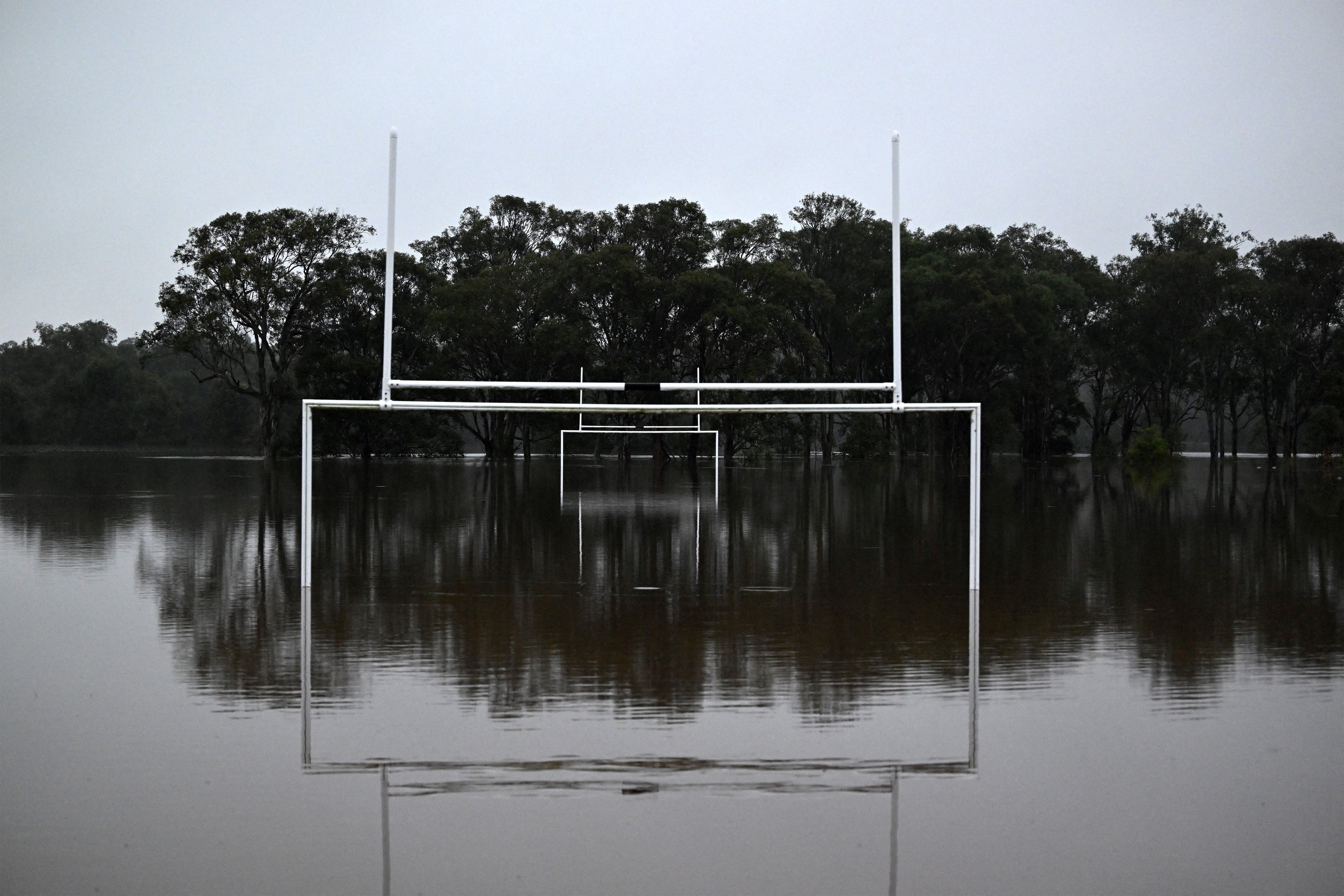 Water level rises inside Cliftleigh Meadows Park from the over flowing Wallis Creek in Gillieston Heights near New South Wales town of Maitland on May 23. 