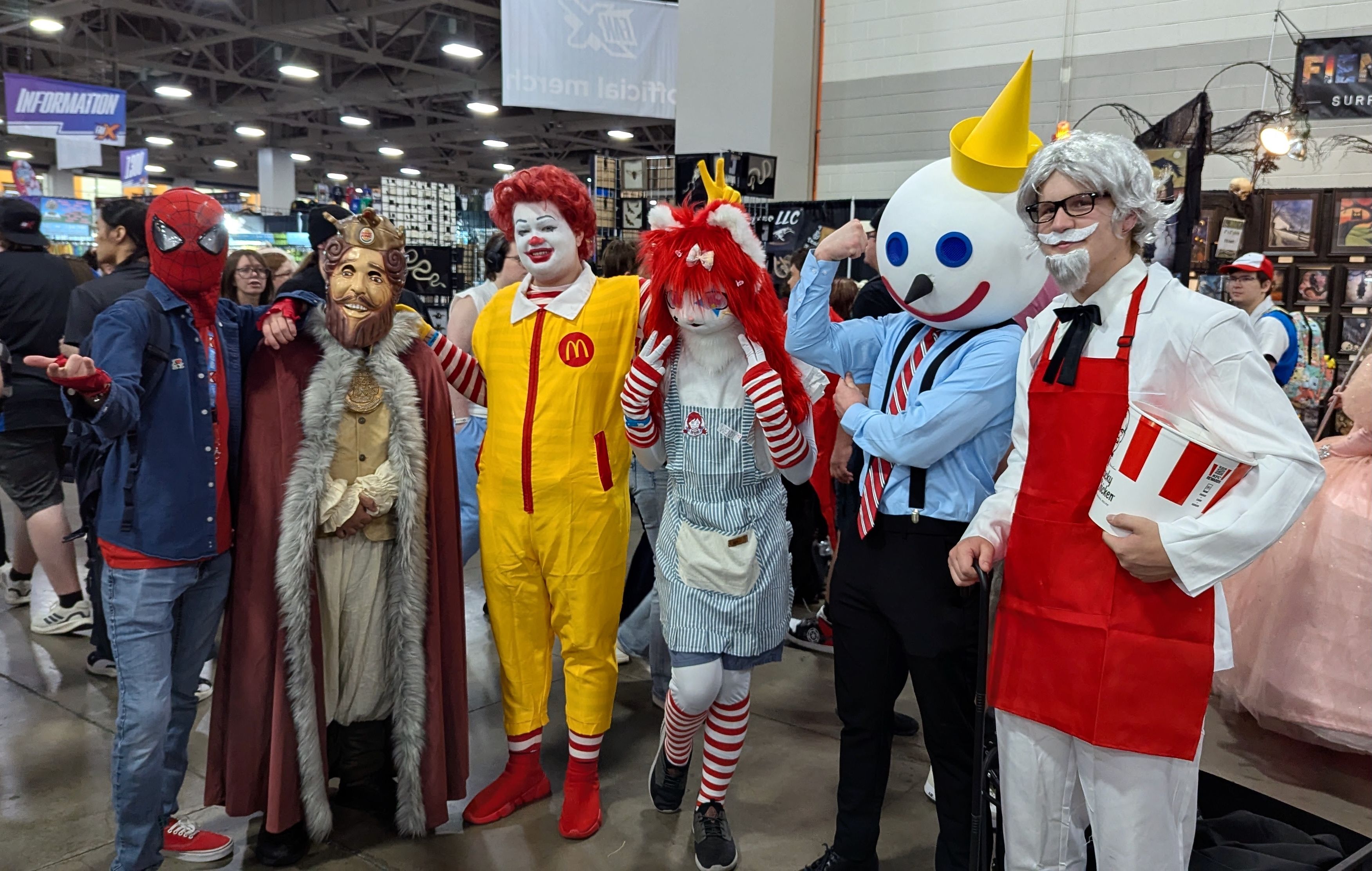 People dressed as restaurant mascots