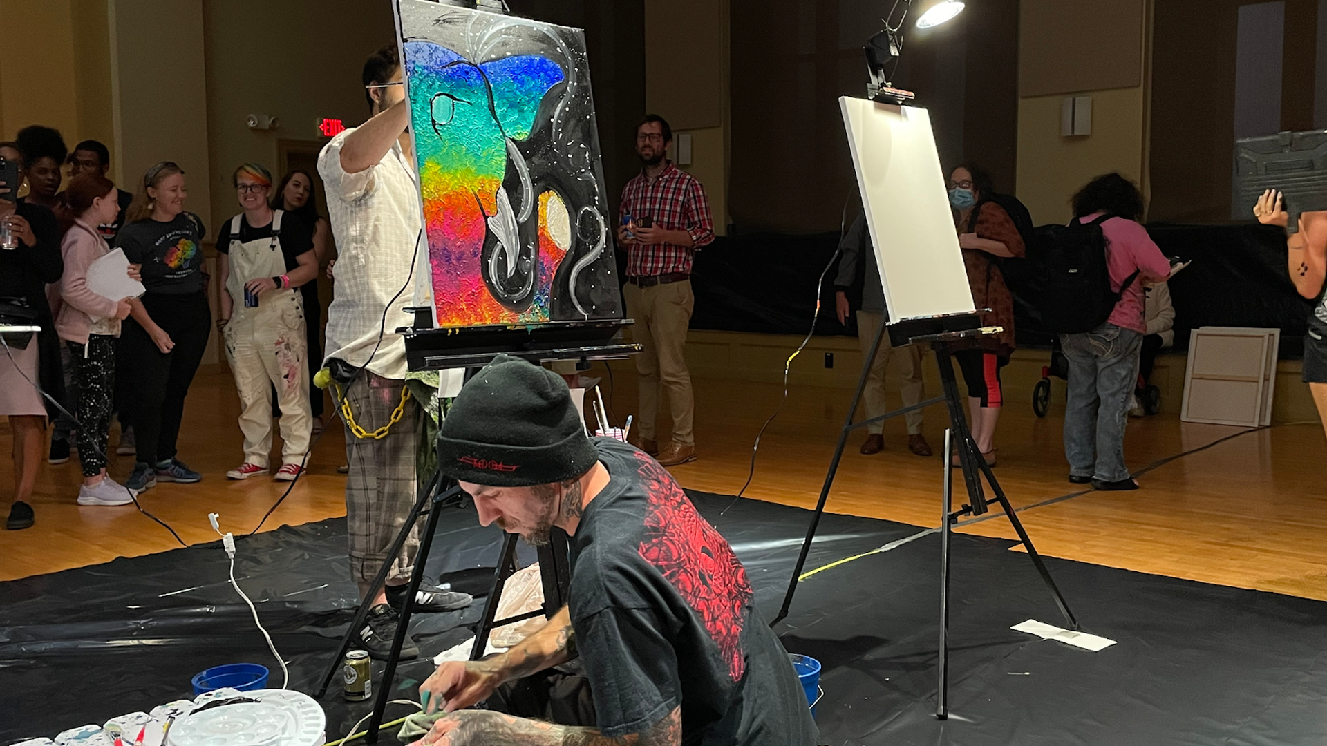 An artist making a painting.