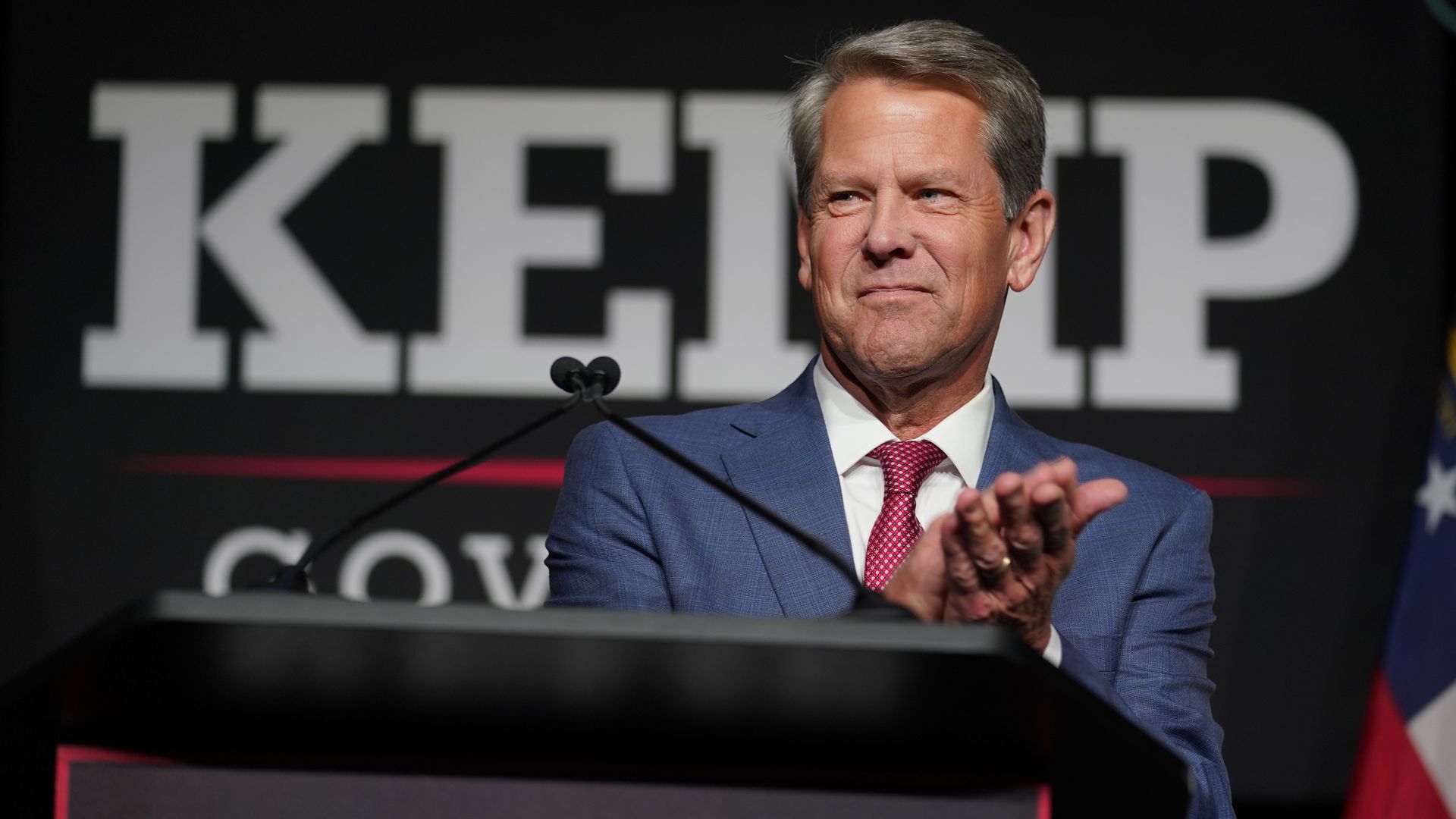 Brian Kemp clapping