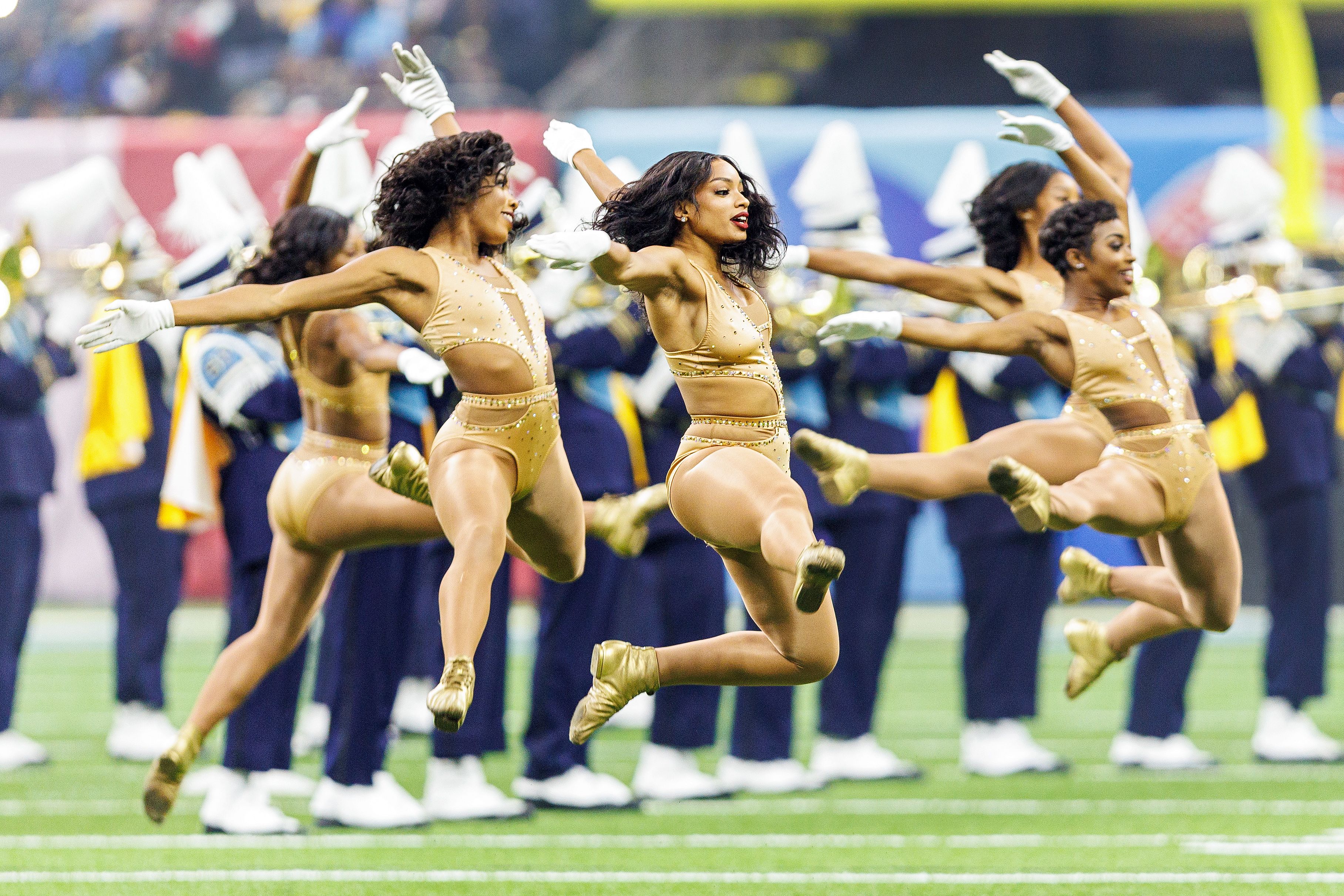 Photo shows dancers performing during the Bayou Classic