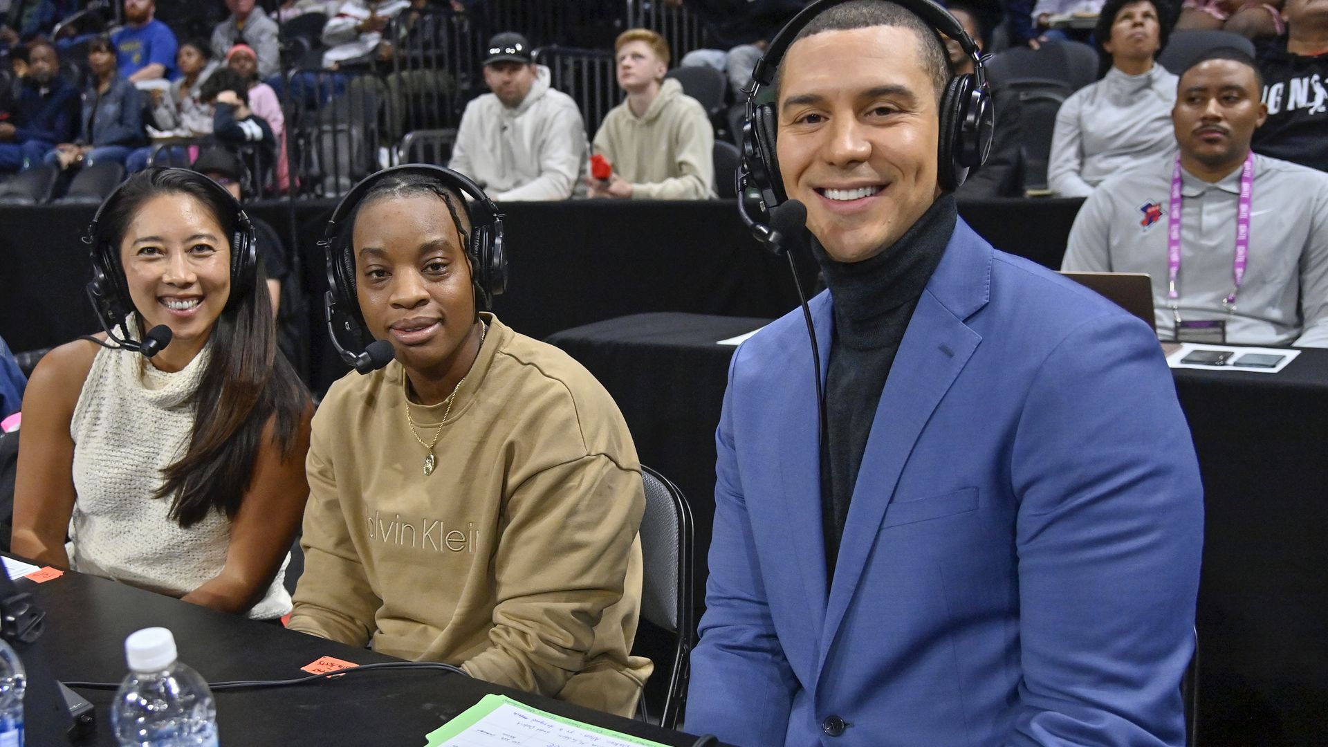 sports announcer at a table