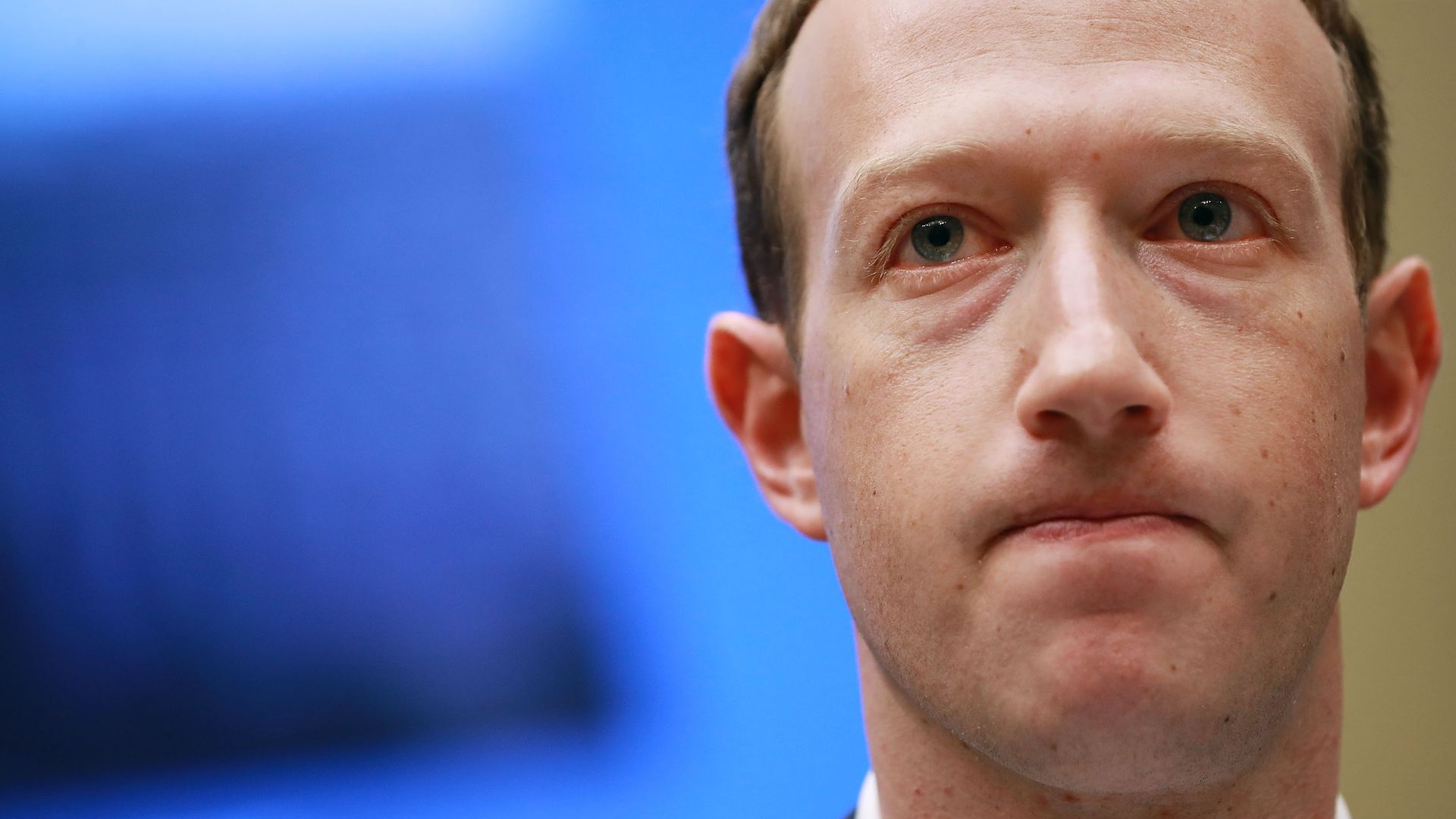 Facebook CEO Mark Zuckerberg grimaces