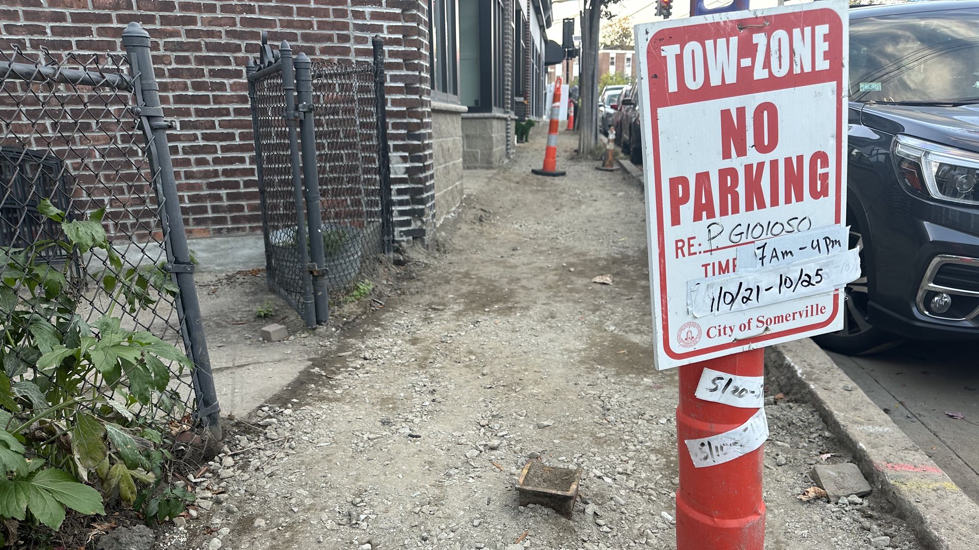 Gravel and dirt over where the sidewalk on Summer Street in Somerville used to be. Sidewalks are a mess while crews repair sewage and sidewalks. 