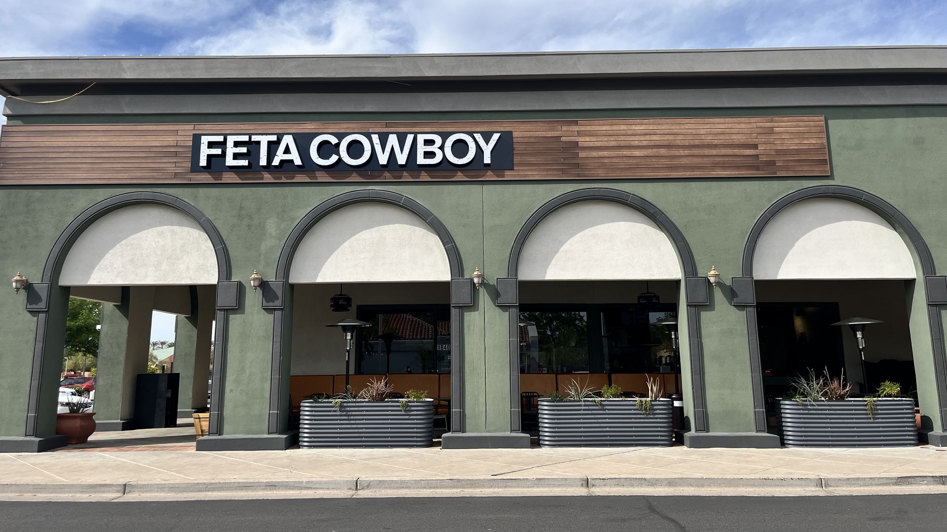 A building that says, "Feta Cowboy."
