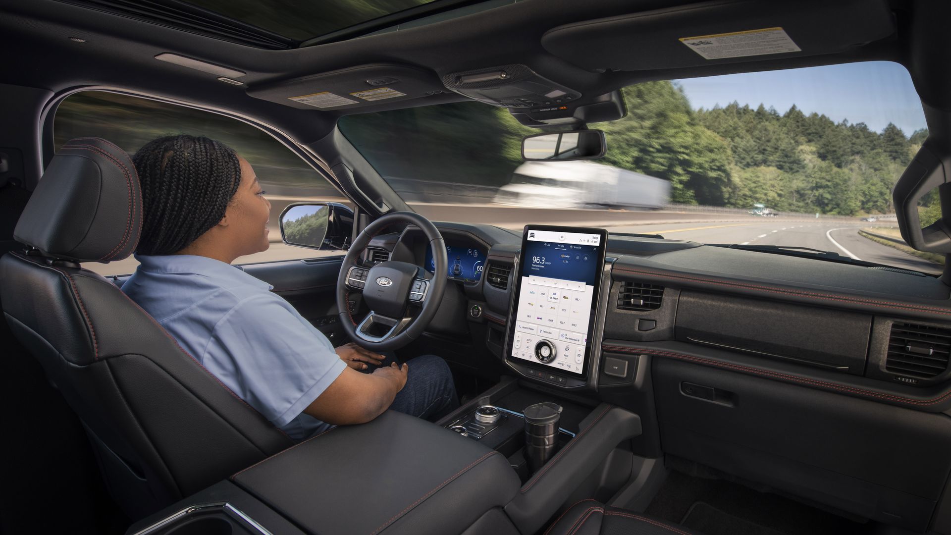 A person drives hands-free with Ford BlueCruise.