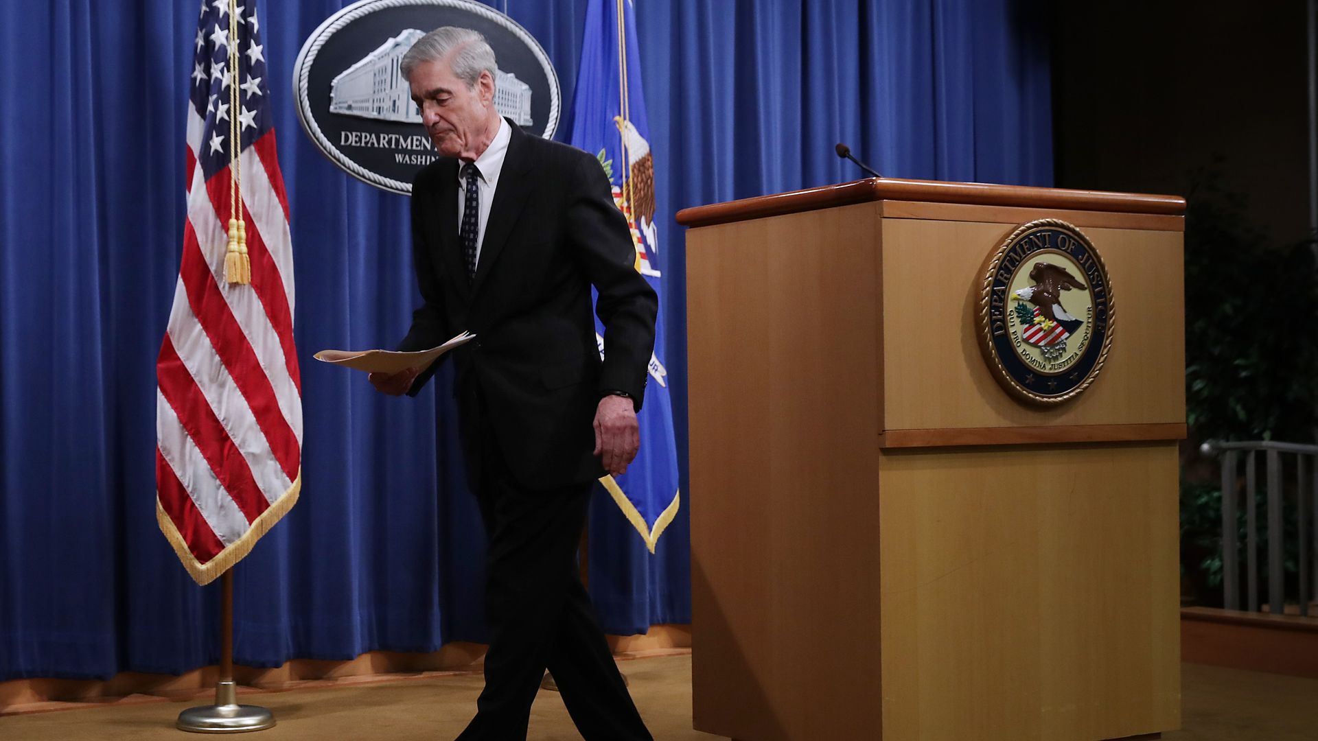 Robert Mueller walking away from podium
