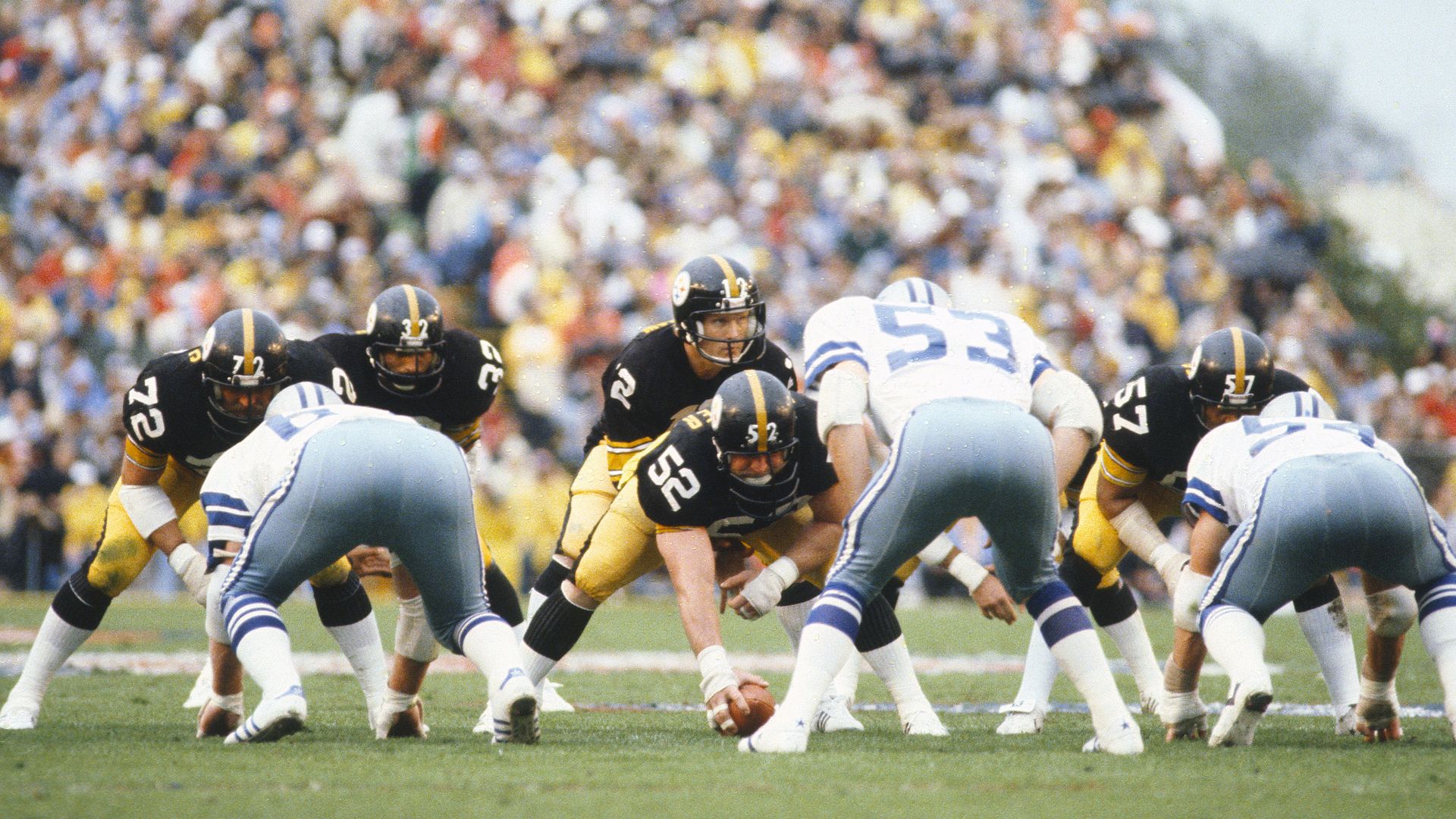 Terry Bradshaw #12 and Mike Webster #52 of the Pittsburgh Steelers against the Dallas Cowboys during Super Bowl XIII. 