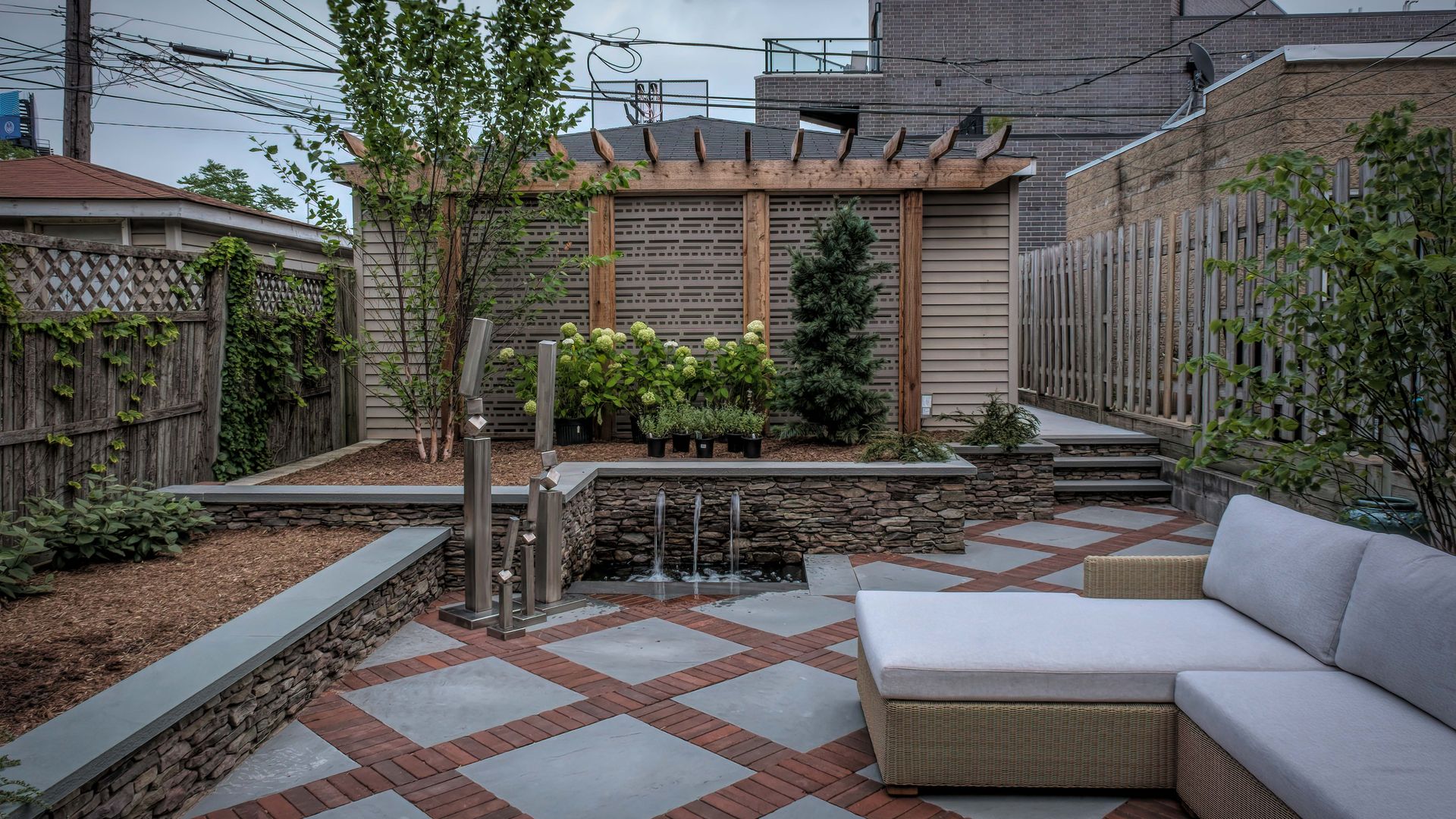 backyard with pavers, not grass