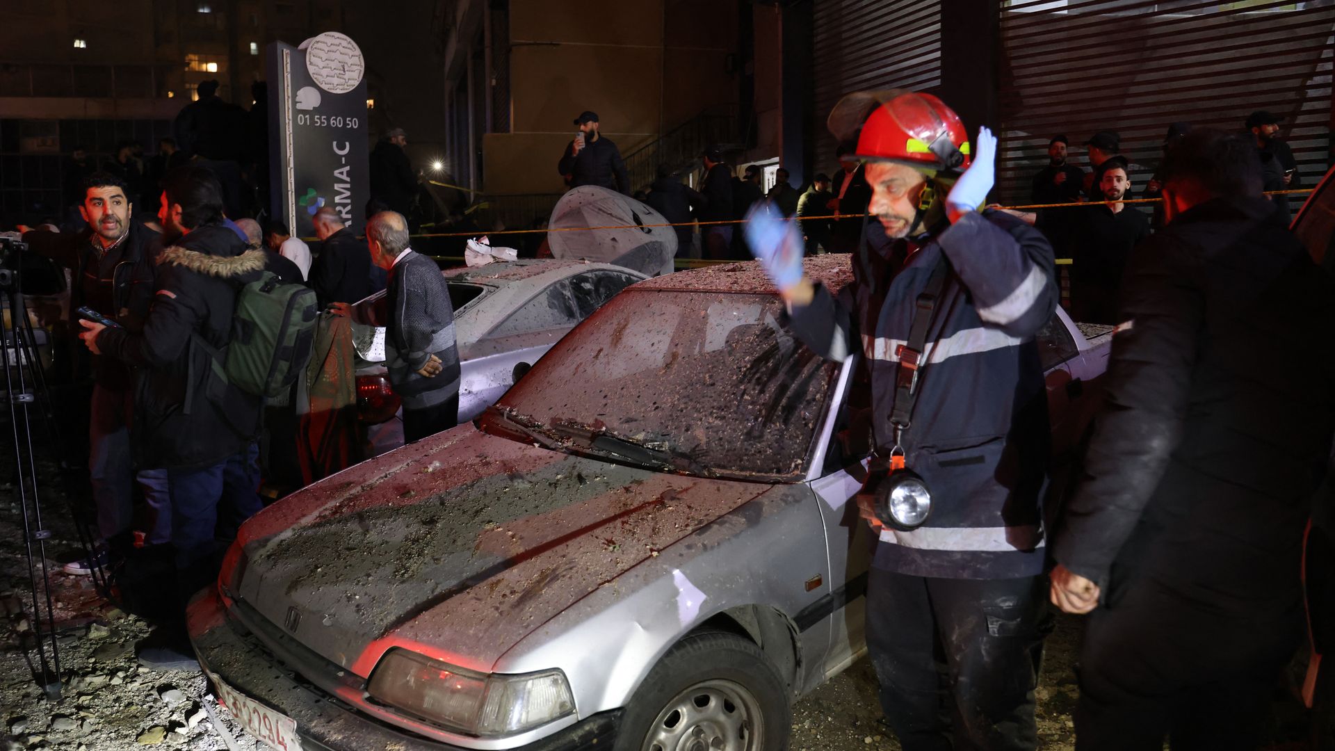Lebanese emergency responders gather at the site of a blast in southern Beirut, Lebanon. Photo: Anwar Amro/AFP via Getty Images