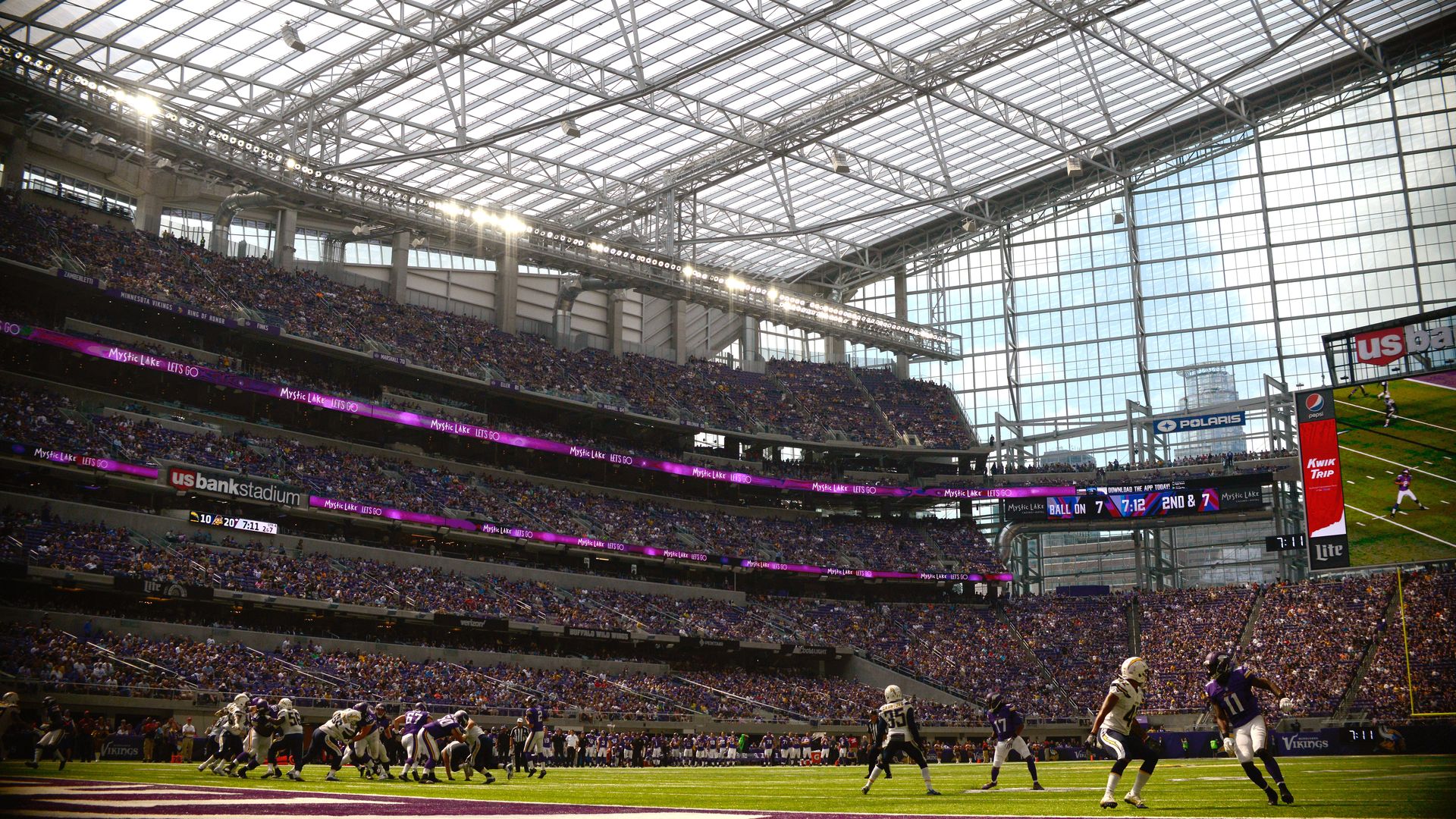A photo from the field of Us Bank Stadium showing the roof and front entrance 