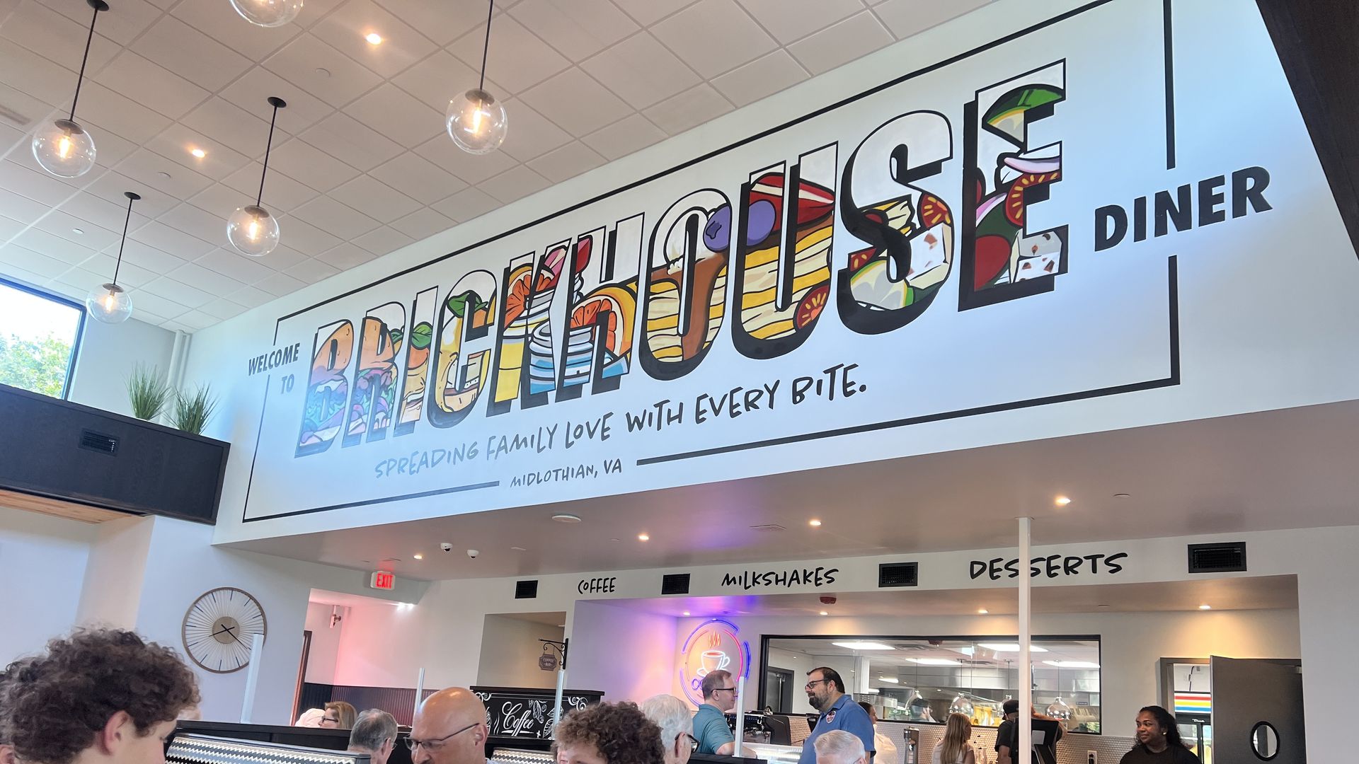 A big mural sign that says Brickhouse diner 