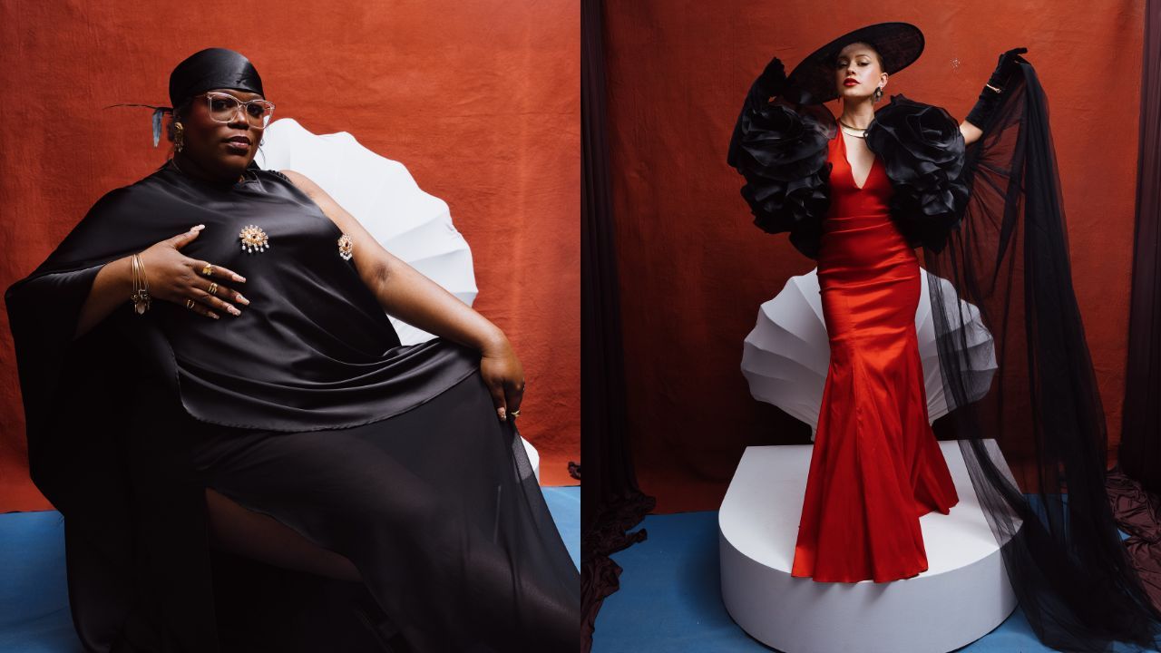 Two fashion portraits against a red backdrop: left, a plus-size woman in black gown with gold brooches; right, a model in a red gown with dramatic black sleeves, hat, and sheer veil on a white platform.