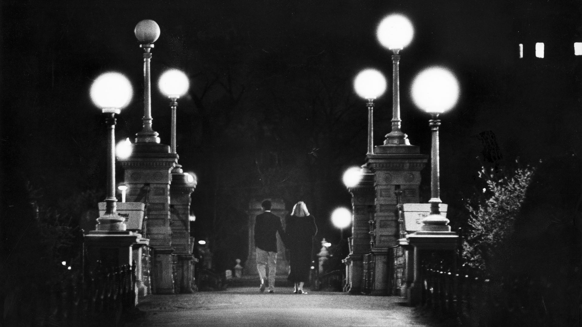A couple on a bridge