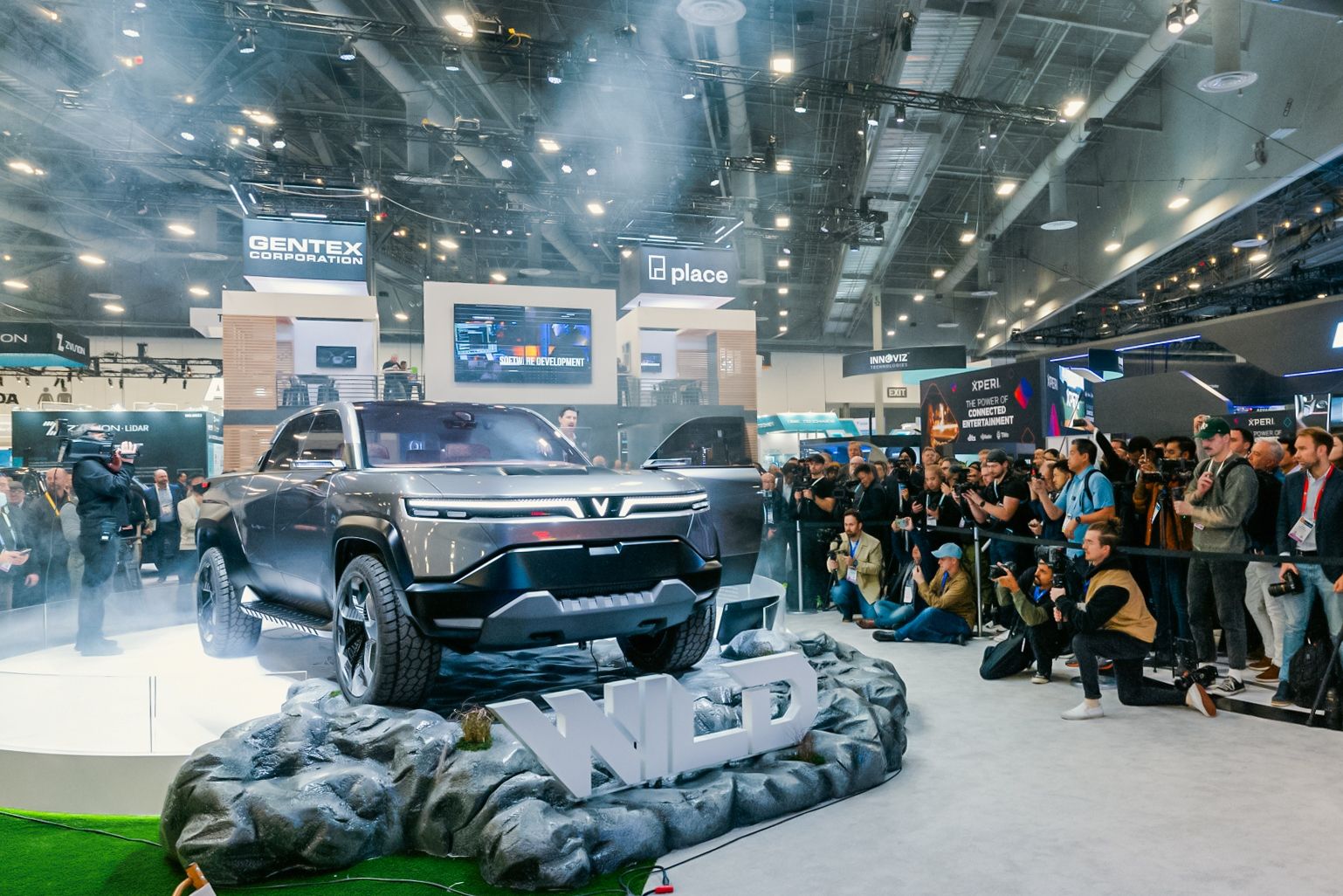 Image of photographers gathered around the Vinfast Wild pickup truck concept at CES