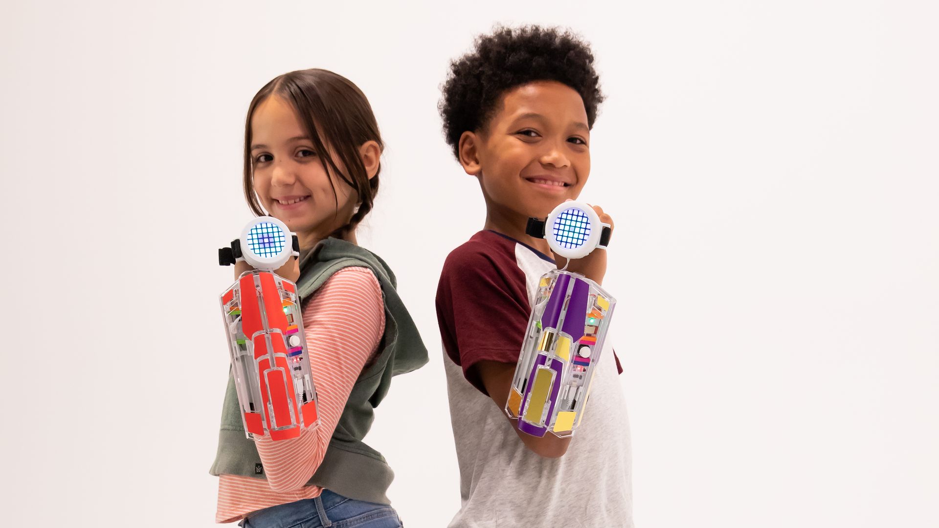 Two kids wearing Little Bits' new Avengers Hero Kit wearable