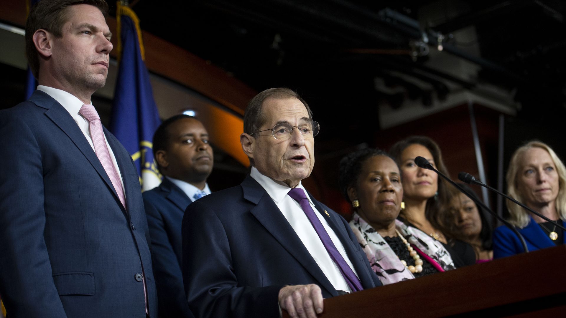This image shows Nadler standing behind a podium and speaking at a press briefing.