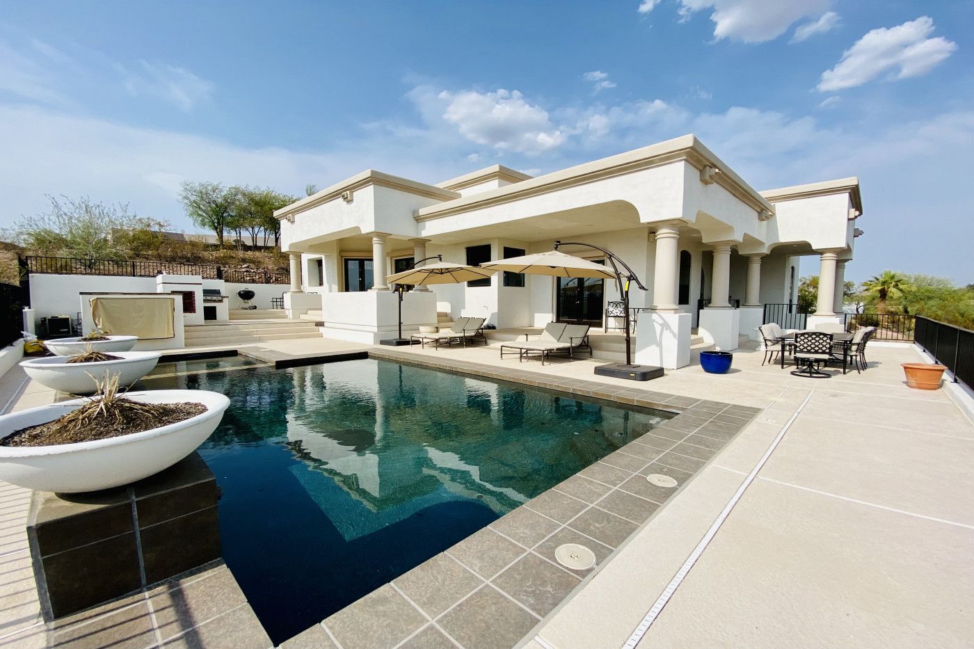 backyard pool of white modern home