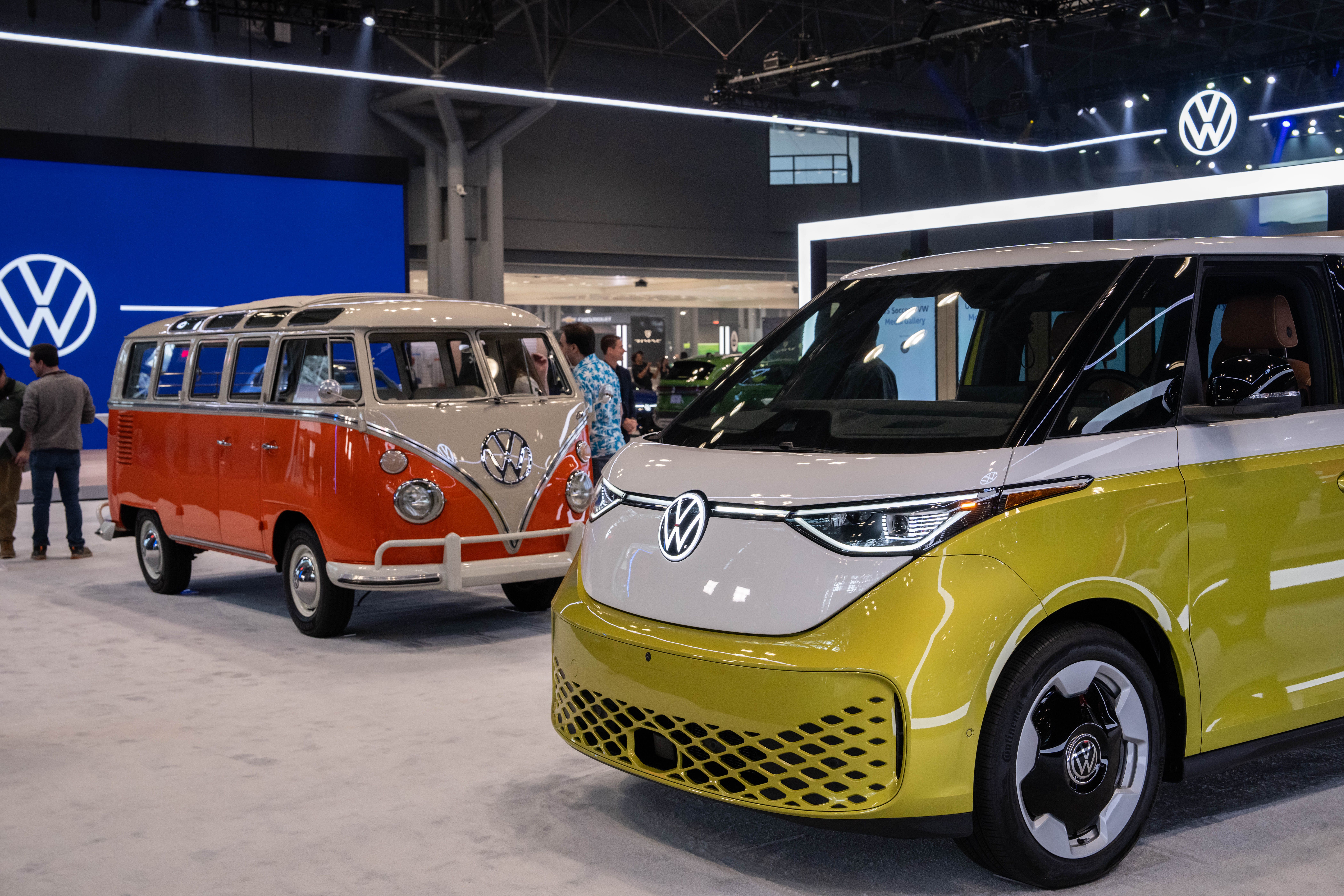 NEW YORK, NEW YORK - APRIL 16: A 2025 Volkswagen ID. Buzz and a 1967 Volkswagen Bus on display at the New York International Auto Show on April 16, 2025 in New York City. The New York International Auto Show is celebrating its 125th year anniversary, amidst the background of tariffs on the automotiv