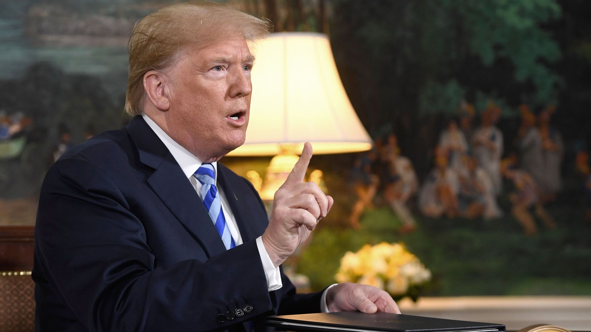 Donald Trump shaking finger from White House lectern