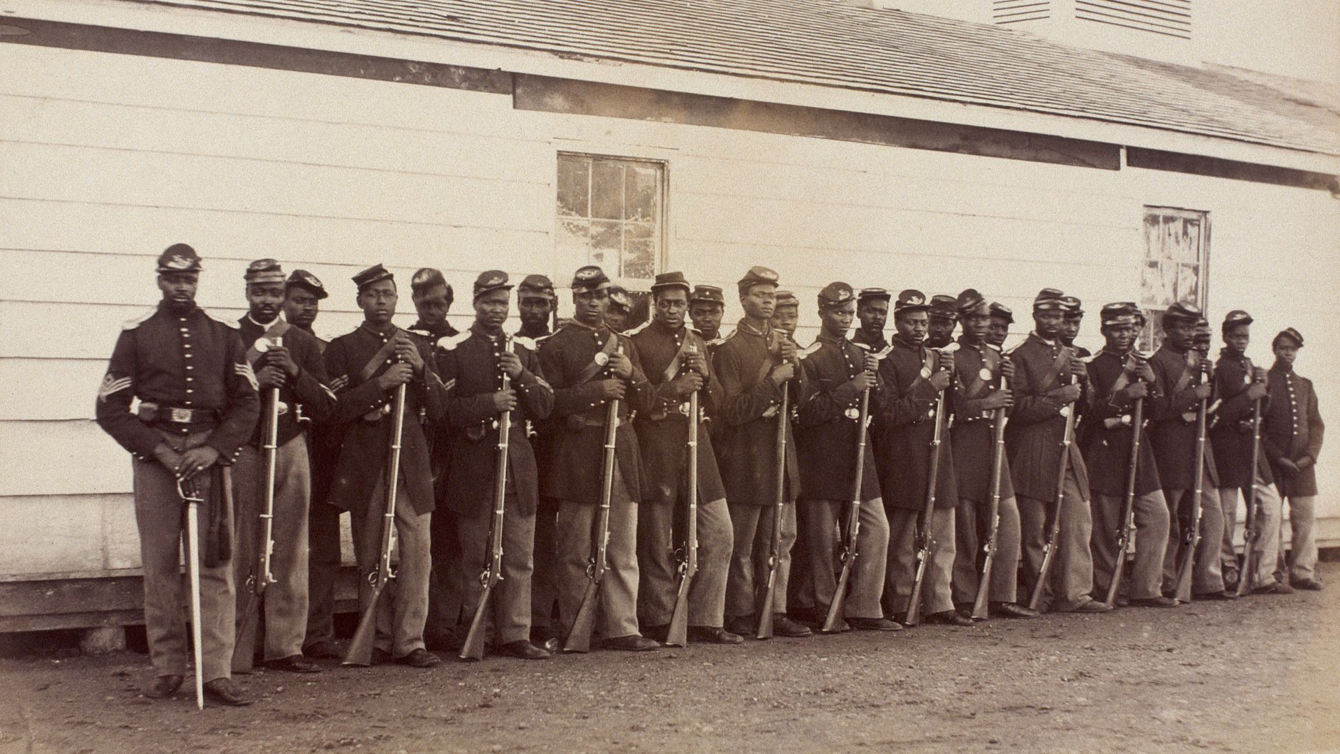 Black union soldiers in front of barracks