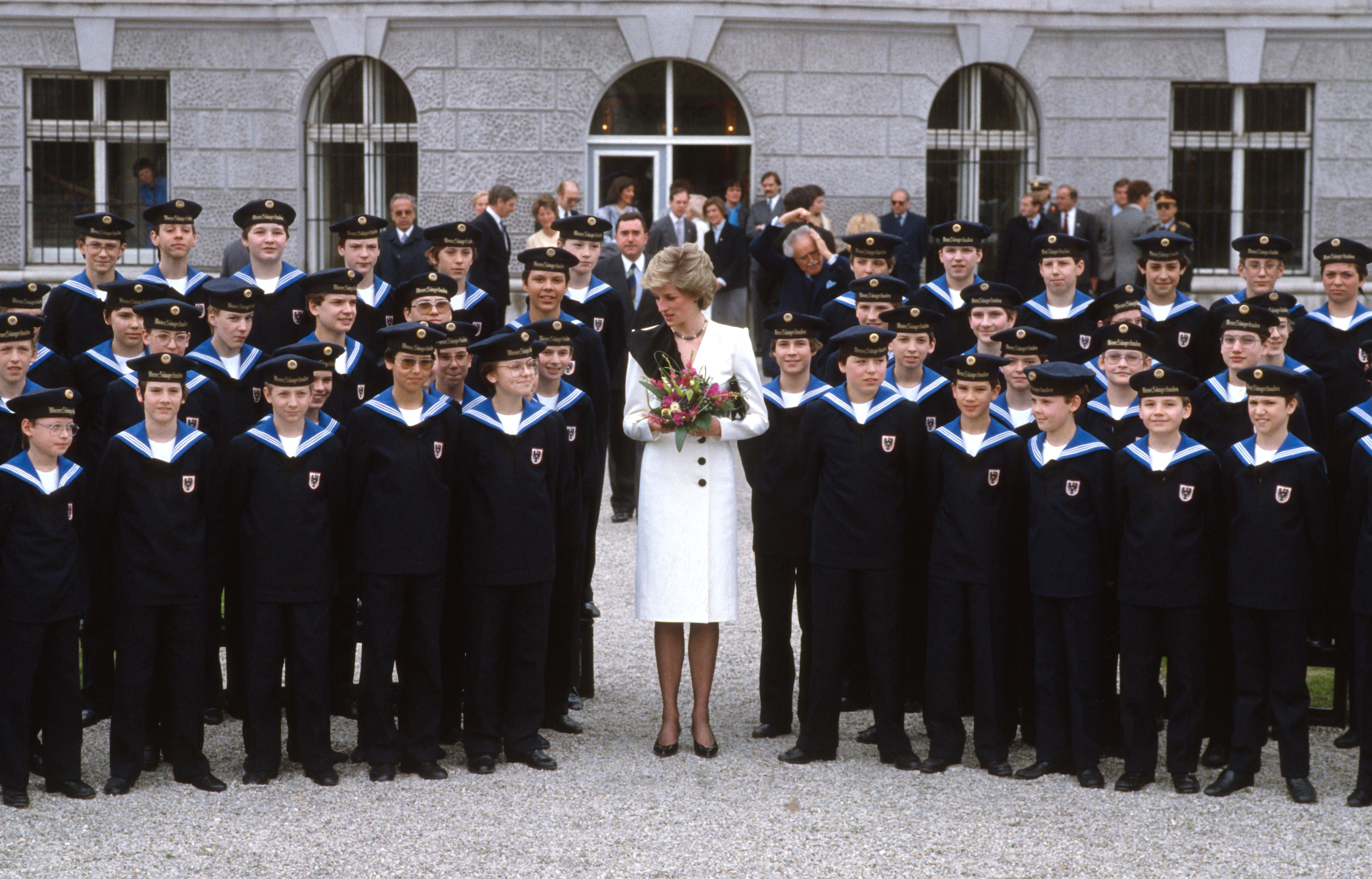 Photo of a boy's choir posing for a photo 