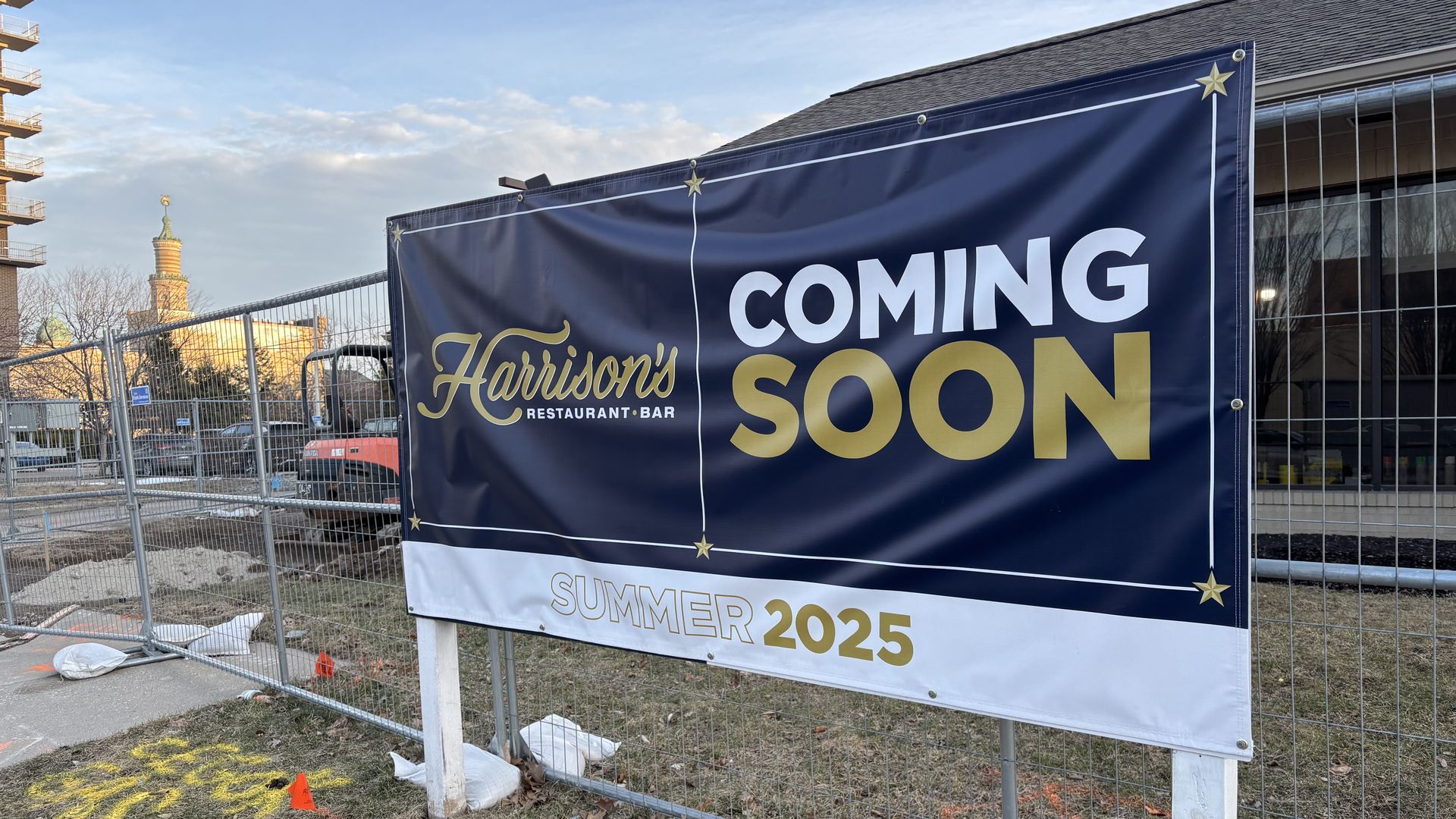 A sign that says Harrison's coming soon 