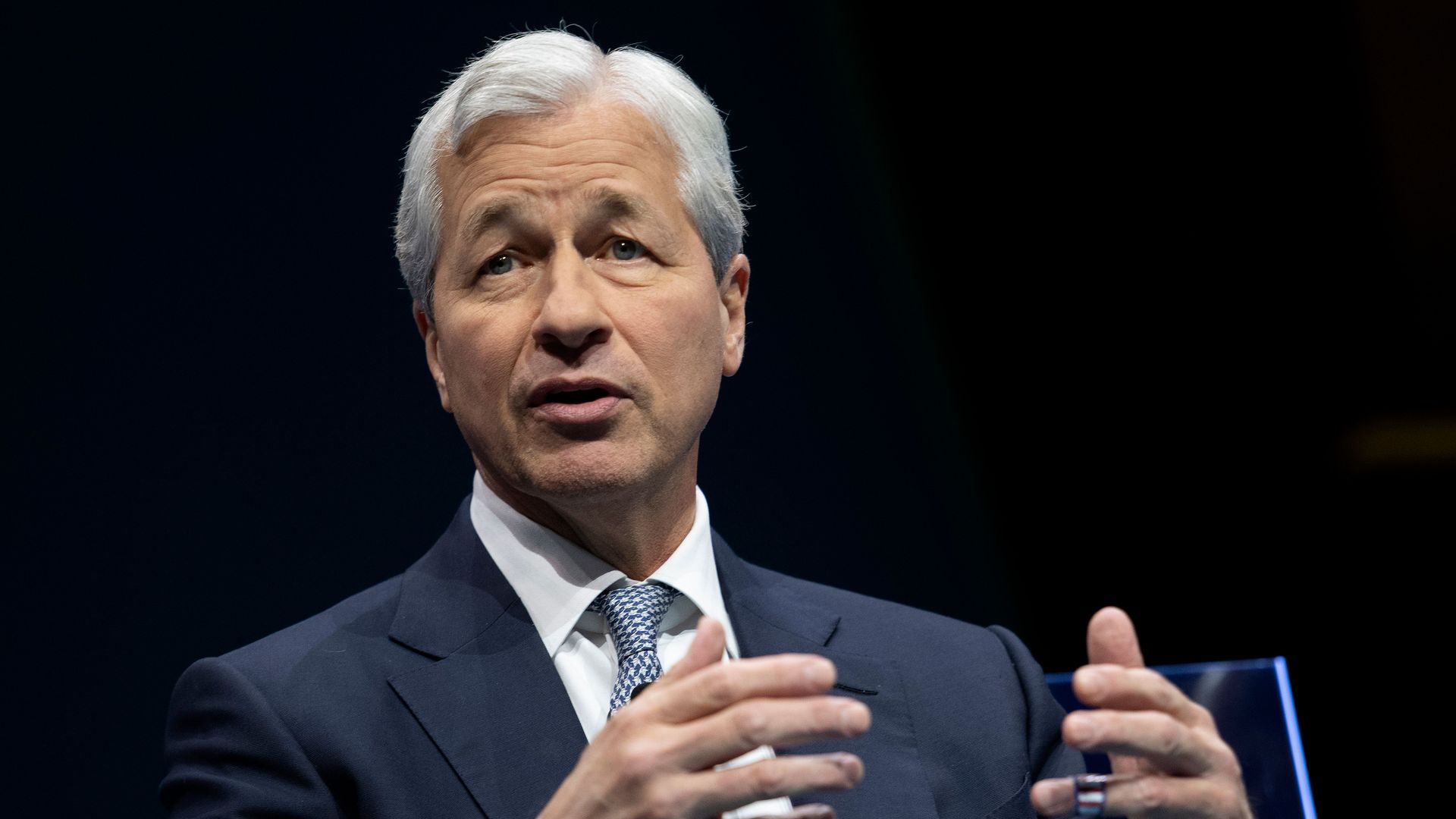 Jamie Dimon gestures.